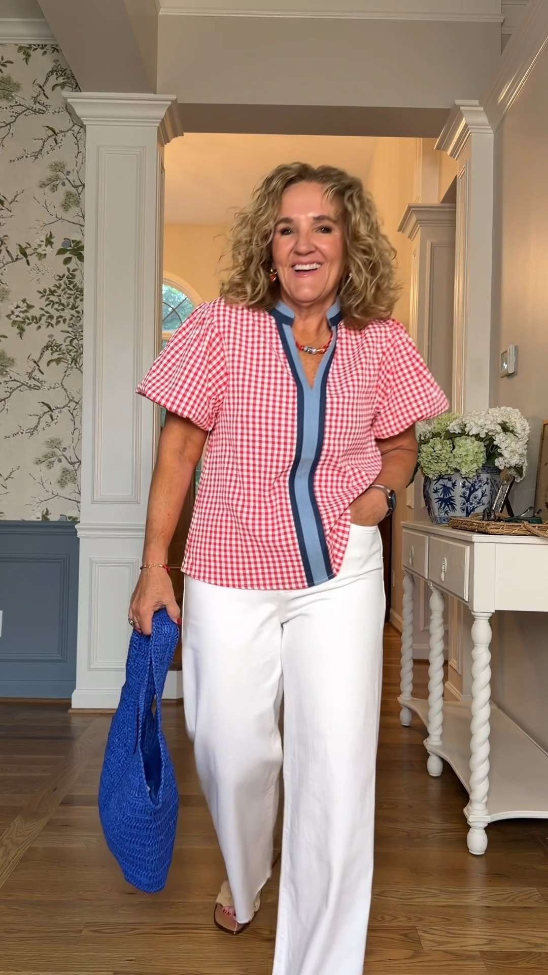 This gingham blouse is a summer favorite with its classic preppy print and contrasting blue trim. Paired with white pants and a bright woven tote, it’s an easy outfit for vacations, brunch, holidays, and everyday summer style.

💡 LTK MADE EASY

❤️ Heart = Support my posts
🔖 Save = Get sale & restock alerts
📋 Lists = Keep favorites organized
📲 Share = Send to yourself for later
💬 Comment = Ask me anything 

 #LTKootd #LTKSeasonal #LTKOver40