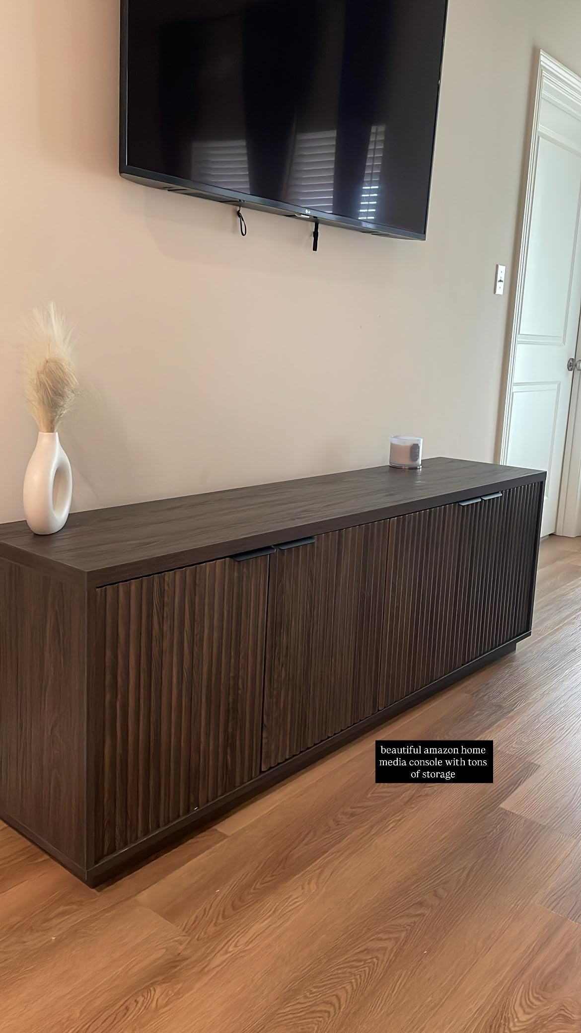 Upgrade your living room with this stylish TV stand. It has plenty of storage and looks great with any decor. Perfect for all your media needs!//TVStand LivingRoomFurniture MediaConsole EntertainmentCenter StorageSolutions HomeDecor ModernTVStand StylishTVStand LivingRoomStorage MinimalistFurniture TVConsole 

 #LTKHome #LTKSaleAlert