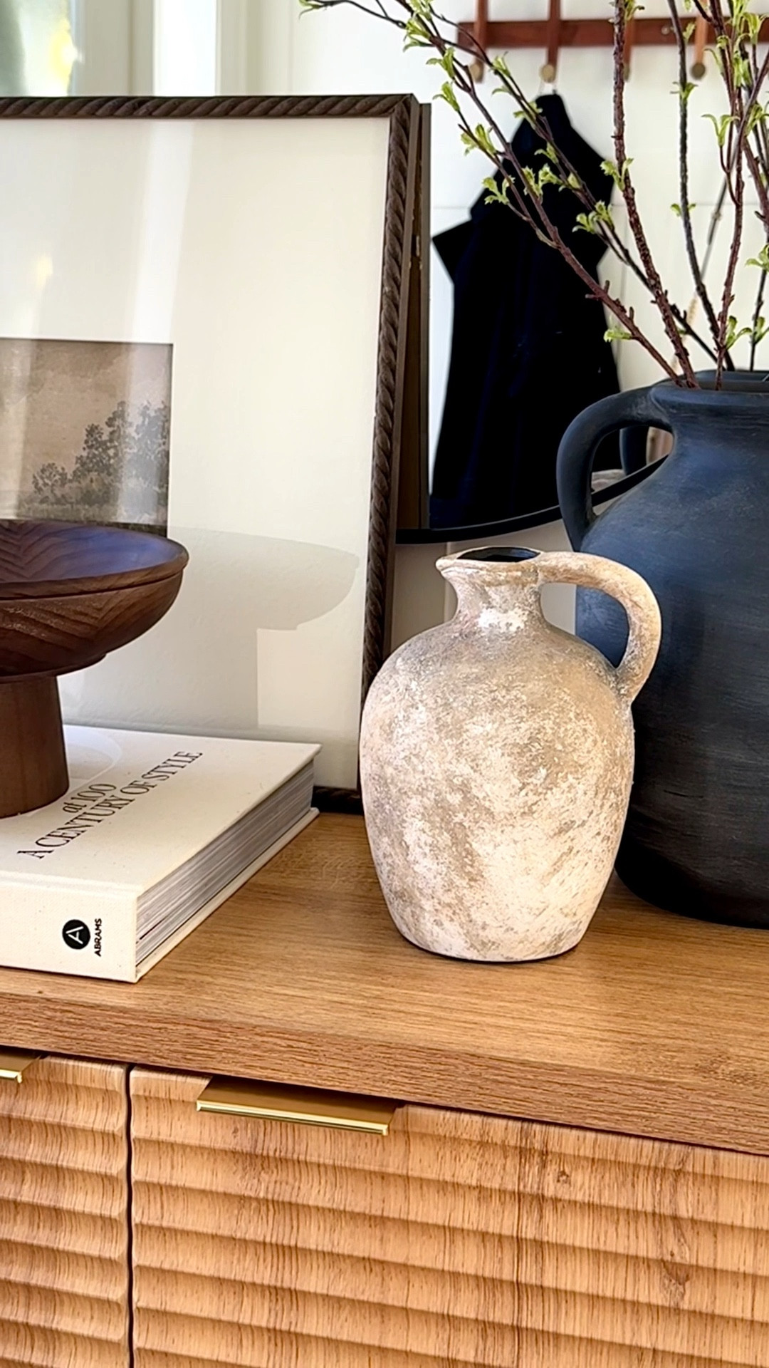 Slowly transitioning into spring while still holding onto winter 🌿

*Branch is from Hobby Lobby and I used only one 
SKU#6649131

Cansole styling, Cabinet styling, home styling, Shoe cabinet, entryway 

#LTKSeasonal #LTKHome