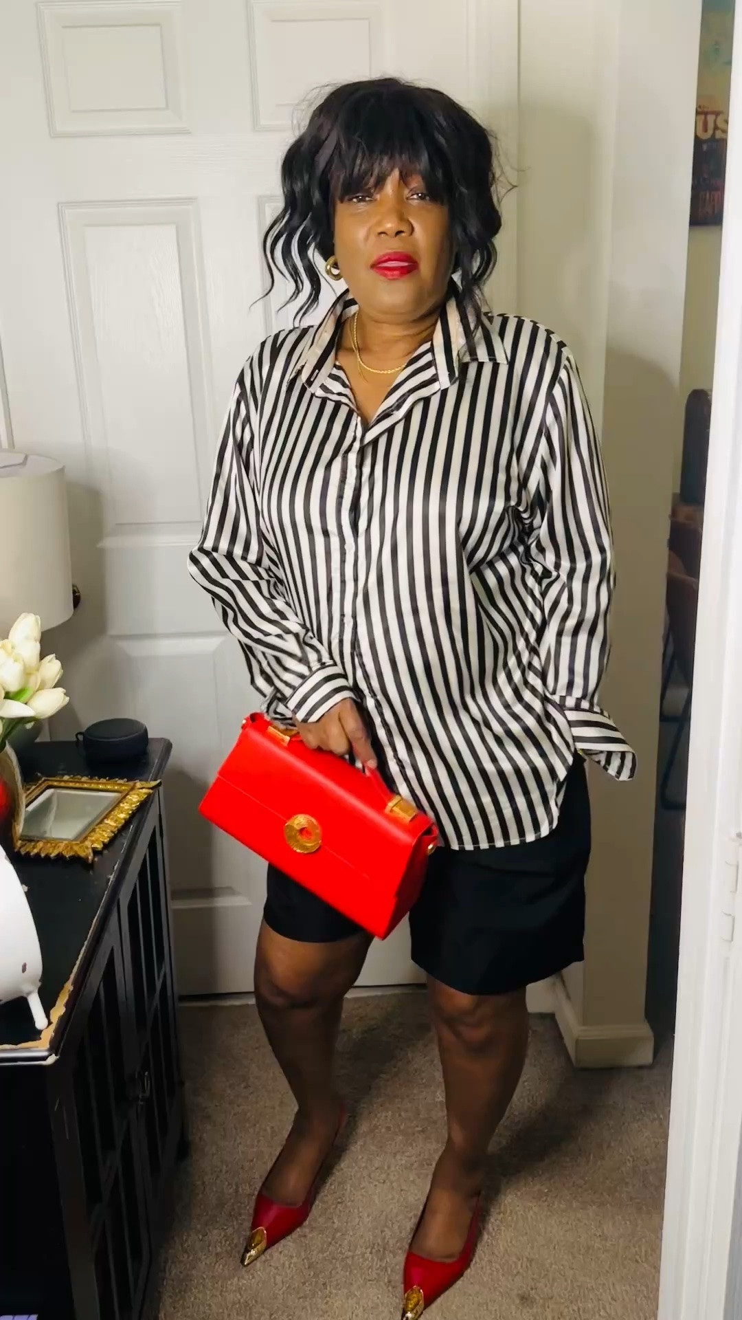 Matching this black and white with a pop of color is a bold mood and fun mood. The red purse and red slingbacks gives the outfit the right amount of pop of color.

#LTKgrwm #LTKMothersDay #LTKootd