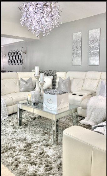 Soft neutrals + glam details ✨ My cozy luxe living room favorites, all linked on LTK! Tap to shop the shag rug, mirrored table, pillows & chandelier. 🤍 #homedecor #neutralhome #ltkhome  

 #LTKHoliday #LTKActive #LTKHome