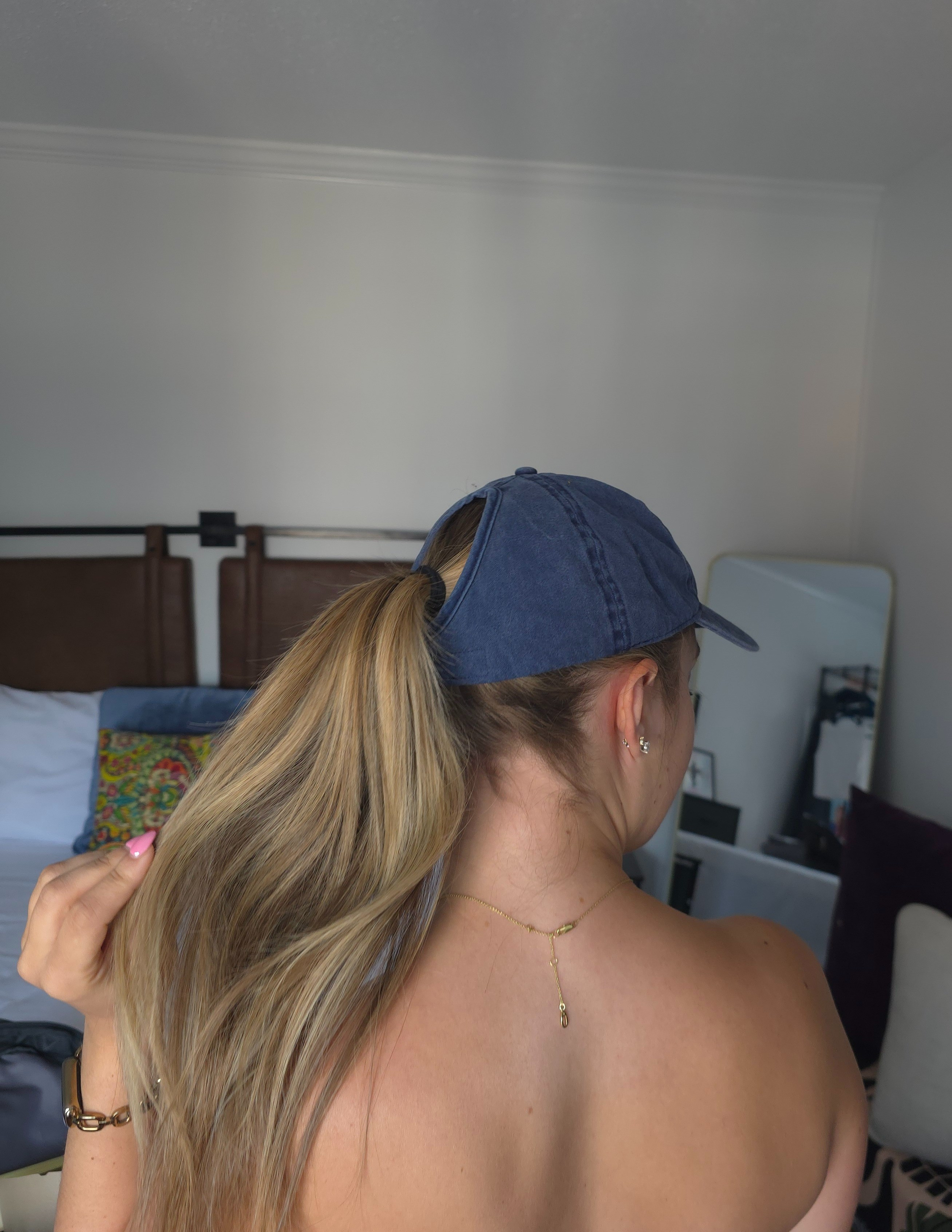 The Ponyflo hat from the back. Adjustable for all different hair styles and easy to take on and off without ruining your hair!

#LTKFindsUnder50 #LTKActive #LTKU