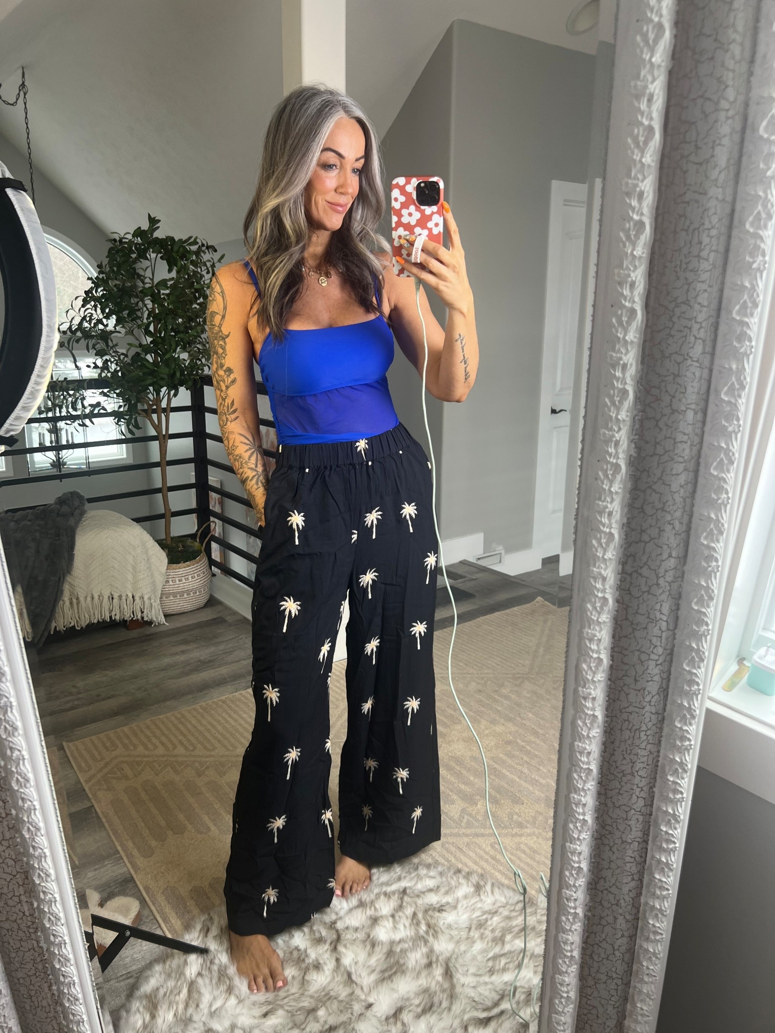 Flatting one piece and cute palm tree pants! Both size M. Use code MIRANDA to save! 

#LTKOver40 #LTKSwim #LTKTravel