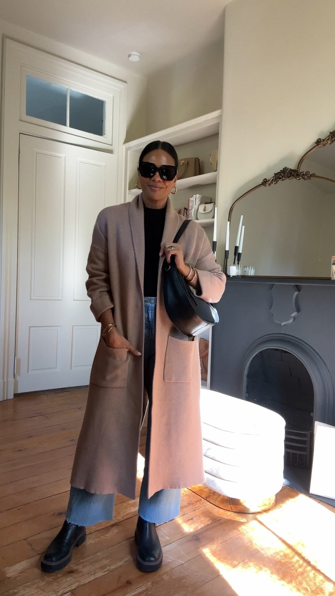 Crisp fall weather calls for another fall outfit! Extra high-waisted ripped wide-leg jean, Cable-knit crewneck sweater, layered with an oversized knitted coat, and Chelsea boots. Accessorized with a Saddle shoulder bag, and chunky gold hoops. 


#LTKover40 #LTKstyletip