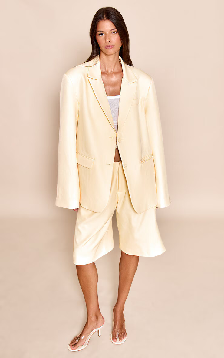 Butter Yellow Tailored Woven Pleated Longline Shorts | PrettyLittleThing US