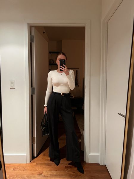 White Abercrombie bodysuit and black pants 