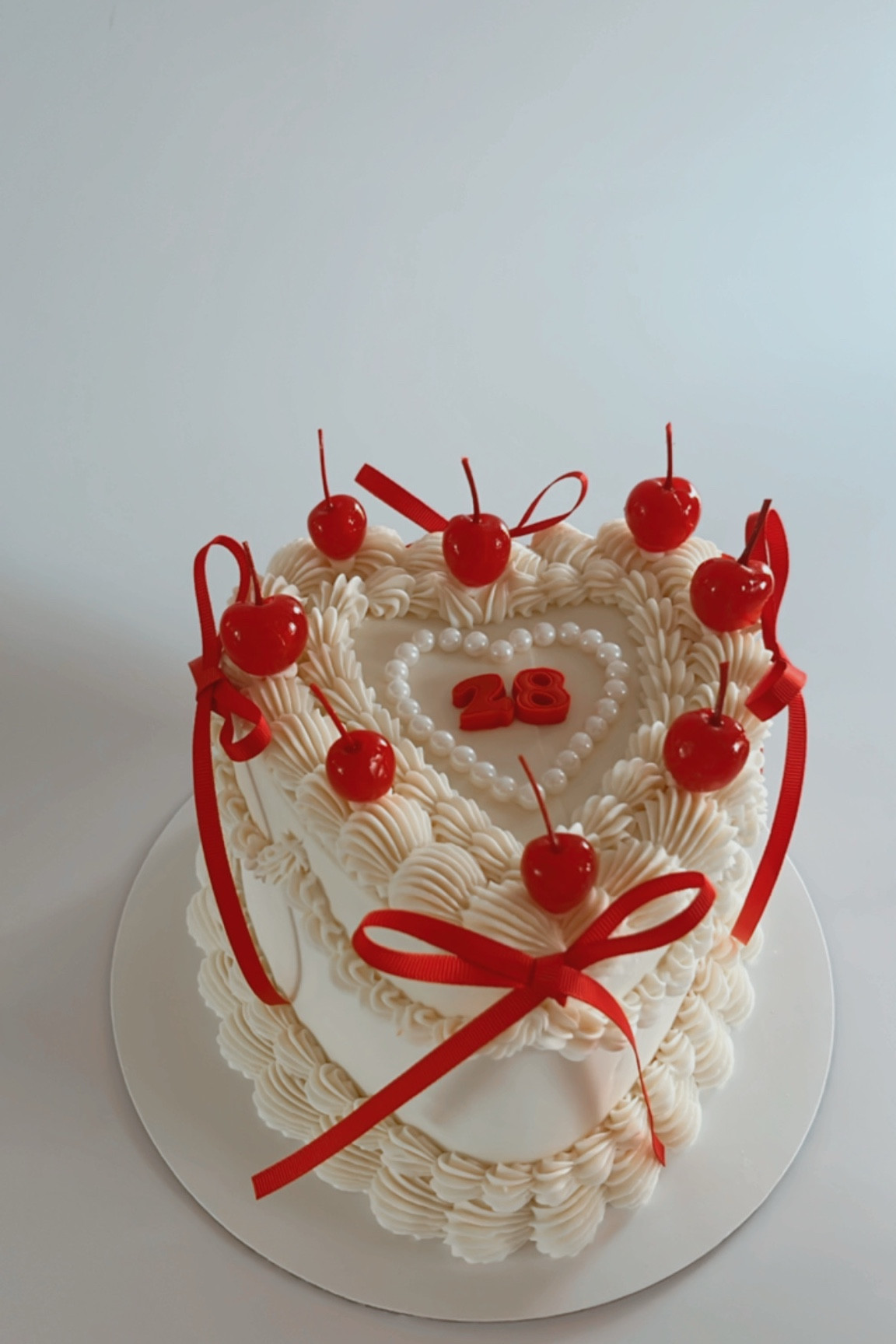 Show STOPPER cake😍😍 the red details with the white frosting are my favorite!! 

#LTKHoliday #LTKParties #LTKSeasonal