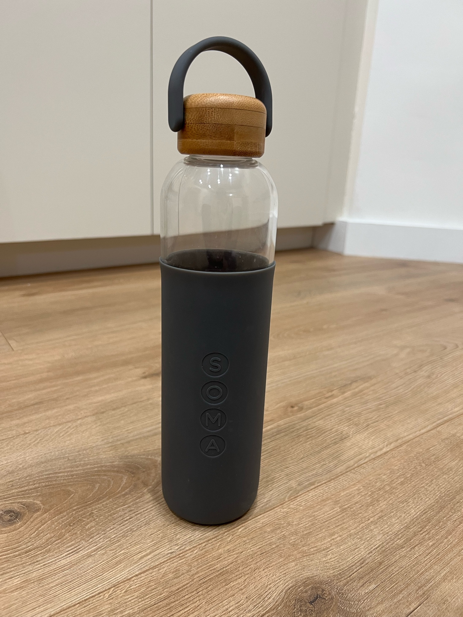 Glass water bottle with bamboo lid 😍

#LTKfamily #LTKhome #LTKtravel