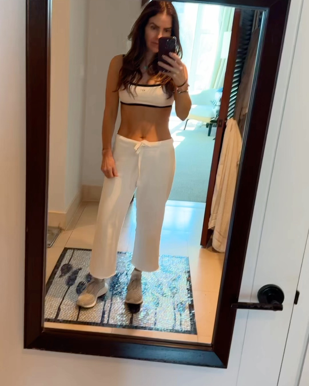 the best part about an at home (or at hotel) workout is i love wearing my fav sweats &/or pjs from the night before🤍 

shop my must-have gift guide for active lovers below!

my new fav wkout bra runs tts im wearing a small & my fav travel sweats (that i wore on the plane over) do as well im wearing a small

what virtual workouts do i  do? only @ashley_eckhoff she’s the best! 

#LTKTravel #LTKWatchNow #LTKActive