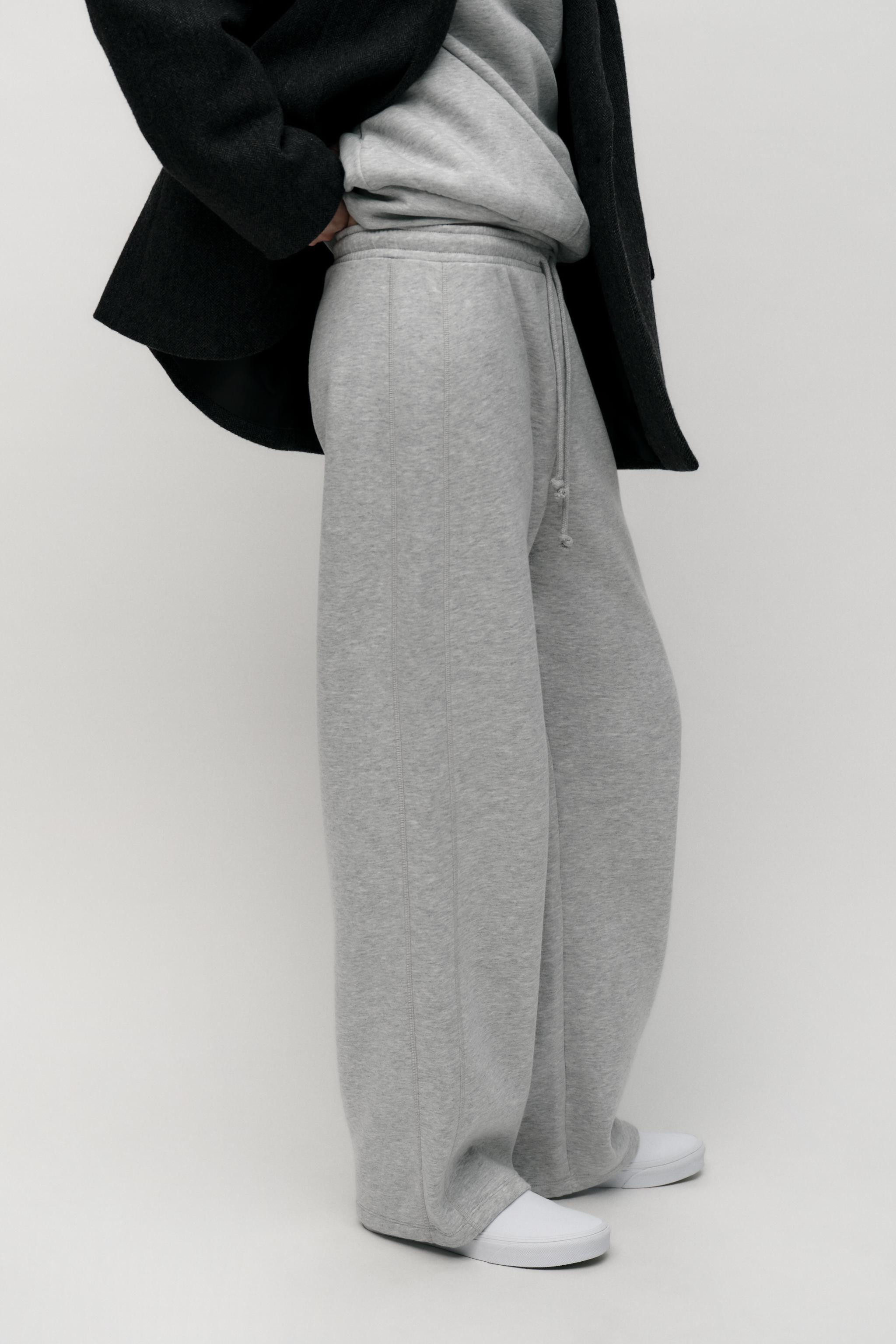 Mid-waist trousers made of a cotton-blend yarn. Featuring an adjustable elasticated drawstring wa... | Zara UK