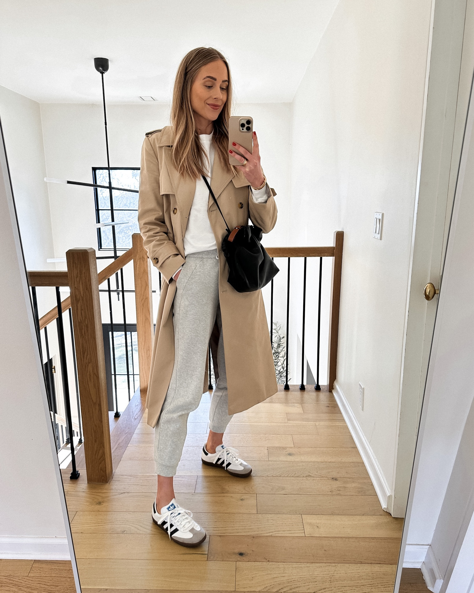 Fashion Jackson wearing long trench coat (small) white sweatshirt (medium) lululemon joggers (size 6) Adidas white sambas, spring outfit, athleisure, weekend #fashionjackson #sneakers #trenchcoat 

#LTKunder100 #LTKstyletip #LTKshoecrush