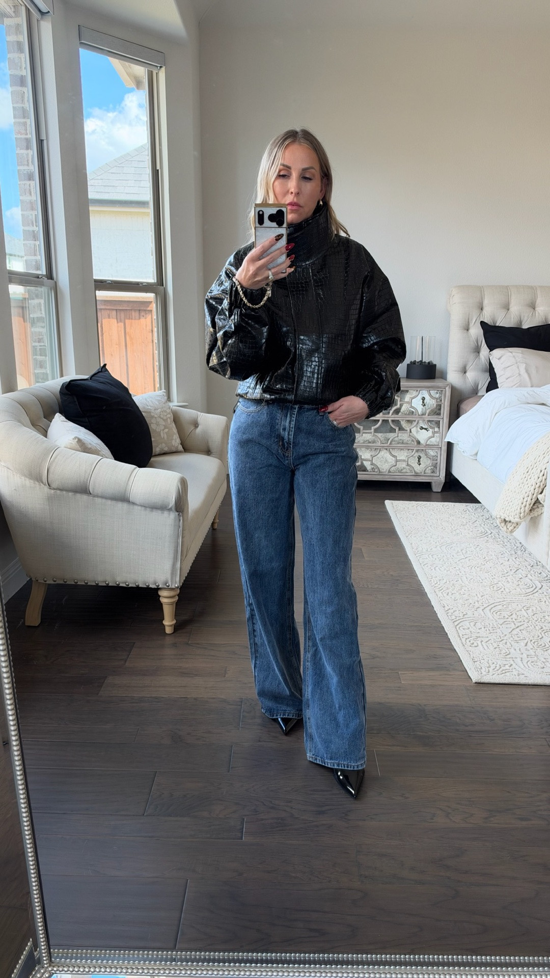 A crocodile textured black jacket is such an easy way to make wide-leg jeans feel more polished. I love the funnel neck and relaxed fit for a simple fall outfit with a little edge.

#FallOutfit #WideLegJeans #BlackJacket #CasualChicStyle