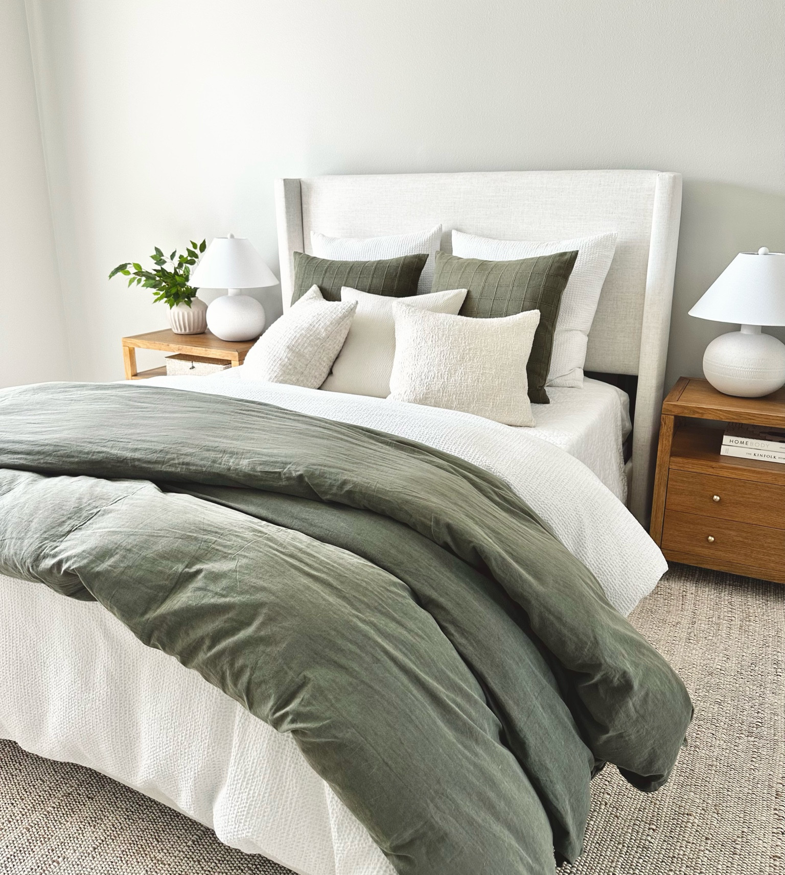 How to create this bedding look:
+ 2 white waffle euros
+ 2 green smaller euros
+ set of 3 textured pillow covers
+ 3 pillow inserts (size up from cover size)
+ organic cotton sheets
+ waffle duvet king on a queen bed
+ linen green duvet cover king size

King bedding on a queen drapes over the sides better and gives a fuller comfy look! However if you’d rather stay with queen size duvets (that works too!) I always do a king insert in a queen to make it fluffier!

Don’t forget this bed needs a box spring and a mattress. I linked what I used and I absolutely love our mattress and topper! Extremely comfortable !

Bedroom ideas, green bedding, green duvet cover, linen duvet, upholstered bed, queen bed, nightstands, bedroom rug, lamps 

#LTKStyleTip #LTKHome