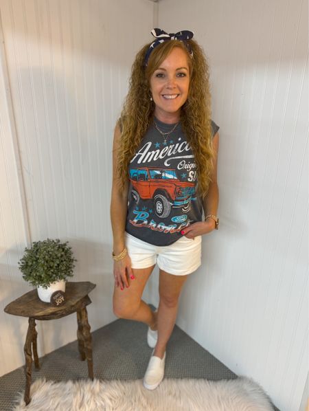 $15 Target Women's Americana Bronco Graphic Muscle Tank Top - Gray / AE Stretch Denim Mom Short / No Boundaries Women's Twin Gore Canvas Slip On Sneakers, Wide Width Available / Memorial Day outfit 

White denim shorts- sized up one size, size 6
Graphic tee- sized up to medium 
Slip on shoes- run big, size down .5 size 

#LTKStyleTip #LTKTravel #LTKFestival