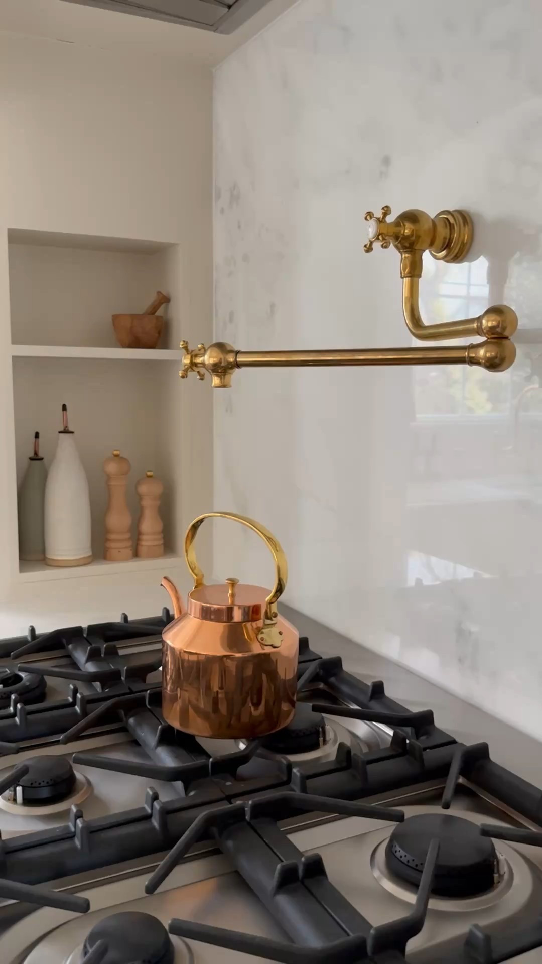 Unlacquered brass fixtures were a foundation of the overall vision of the space. Just weeks after finding them, we traveled to England where they’re made, and fell even more in love with the overall touch. Beyond aesthetics, it was important to bring high function into the space. See details below:

Pot filler: 1,000% worth it for tea and cooking! Especially with wood floors - no dripping, yay! 

Main tap: turn handles with a spout that moves from left to right.

Sprayer: Pull out hose with the temp at either hot or cold

Disposal button: This is a clean, consistent look that is an easy on/off right where you’re already working. It also keeps an ugly switch off the wall.

Filter tap: Comes with its own filtration system for clean drinking water! 


  