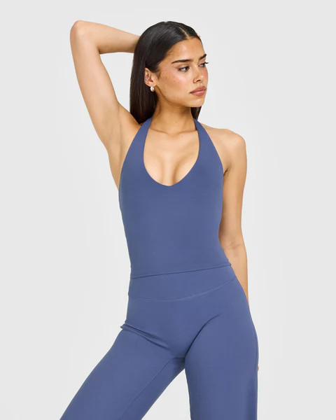 SoftMotion™ Halter Neck Mid Vest with Built in Bra Shelf with White Logo 
 Slate Blue | Oner Active (UK / US)