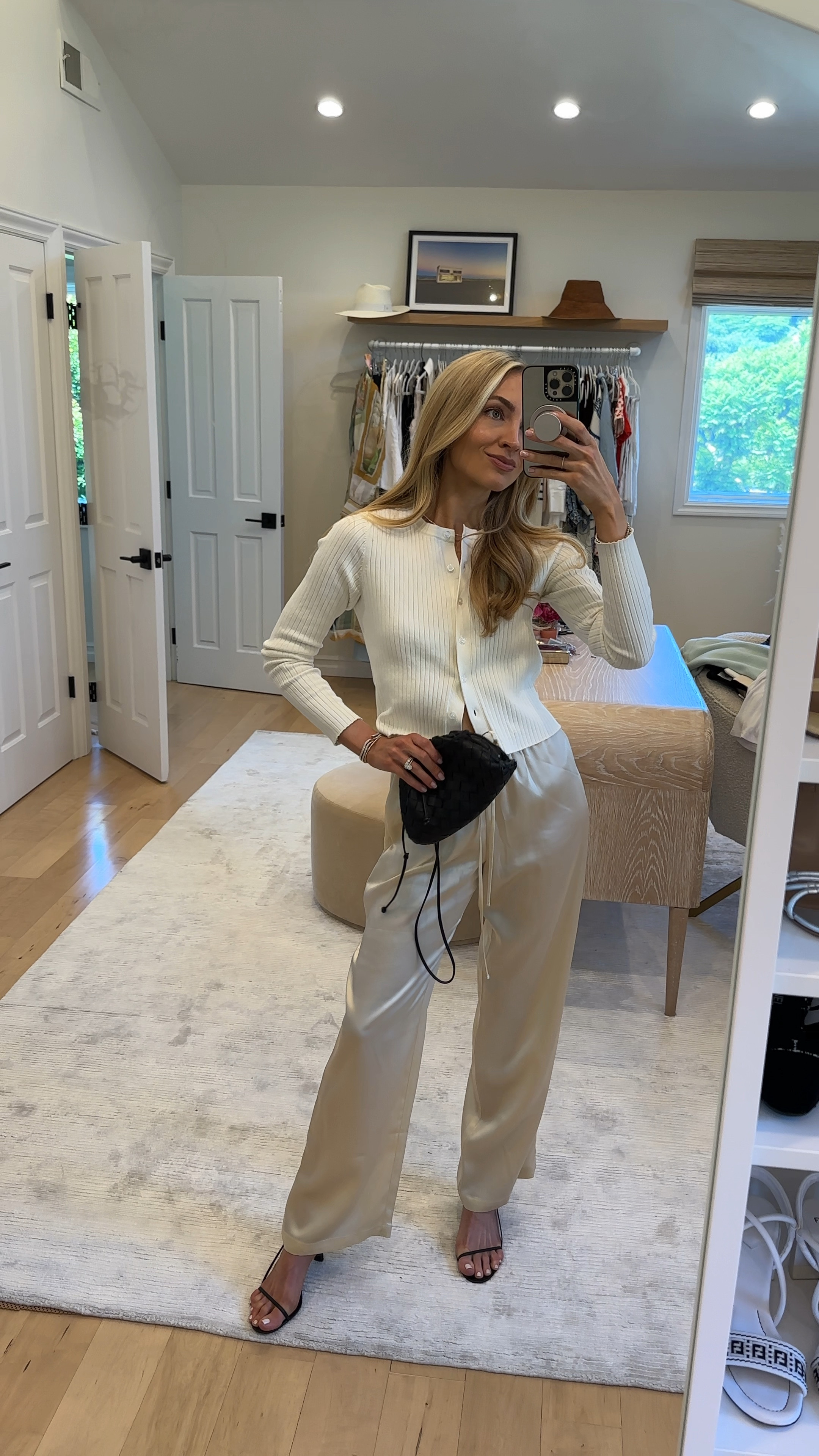 Simple cardi and ivory silk pant combo 🤍 this cropped cardigan works as a top buttoned or over the shoulders with a tank

Sizes worn here:
Pants - XS (TTS)
White cardigan - XS (TTS)

#LTKShoeCrush #LTKSwim #LTKSeasonal