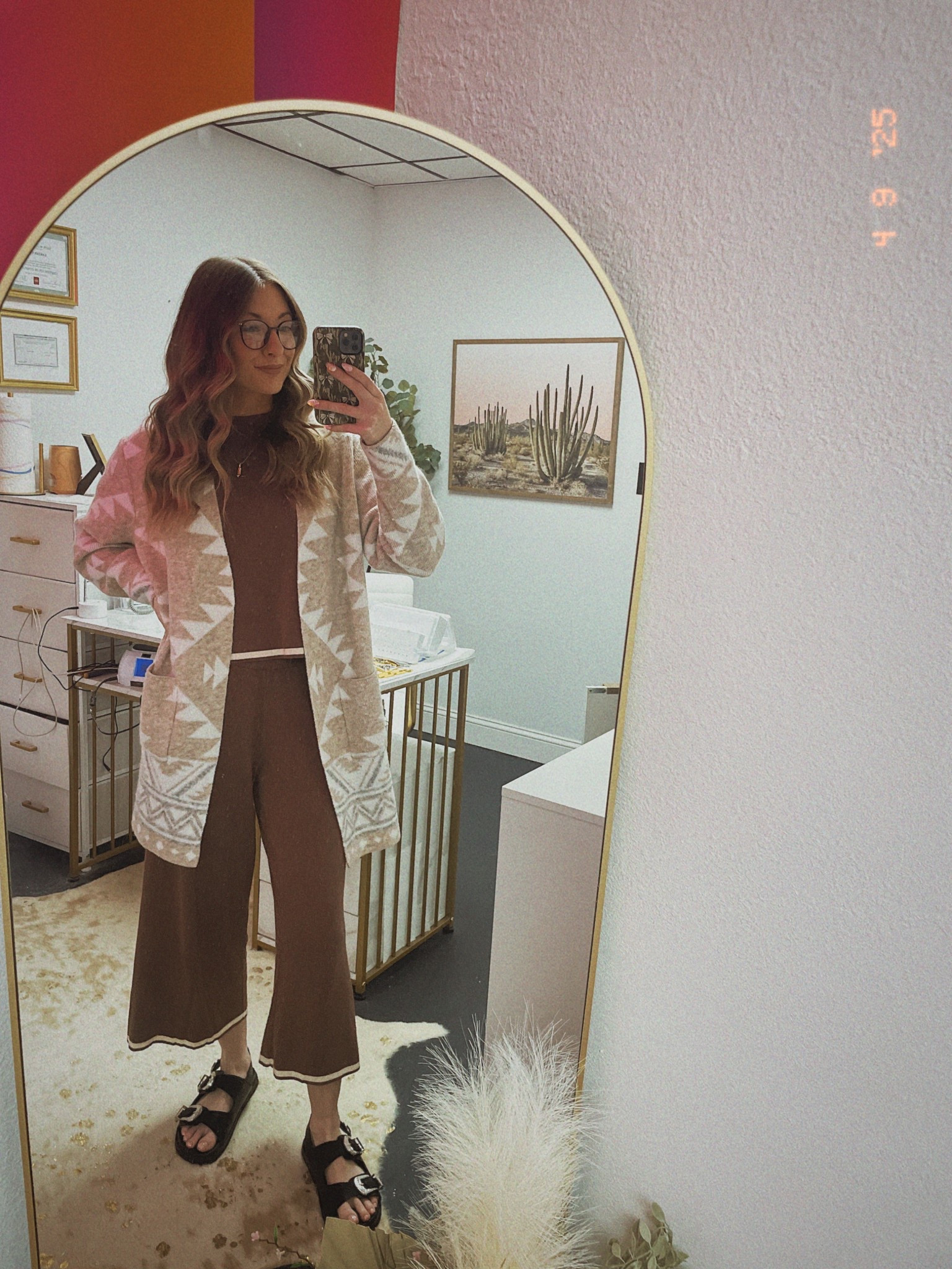 The cardigan is sold out but the brand is FRYE!! You can find one on Poshmark & eBay!! 