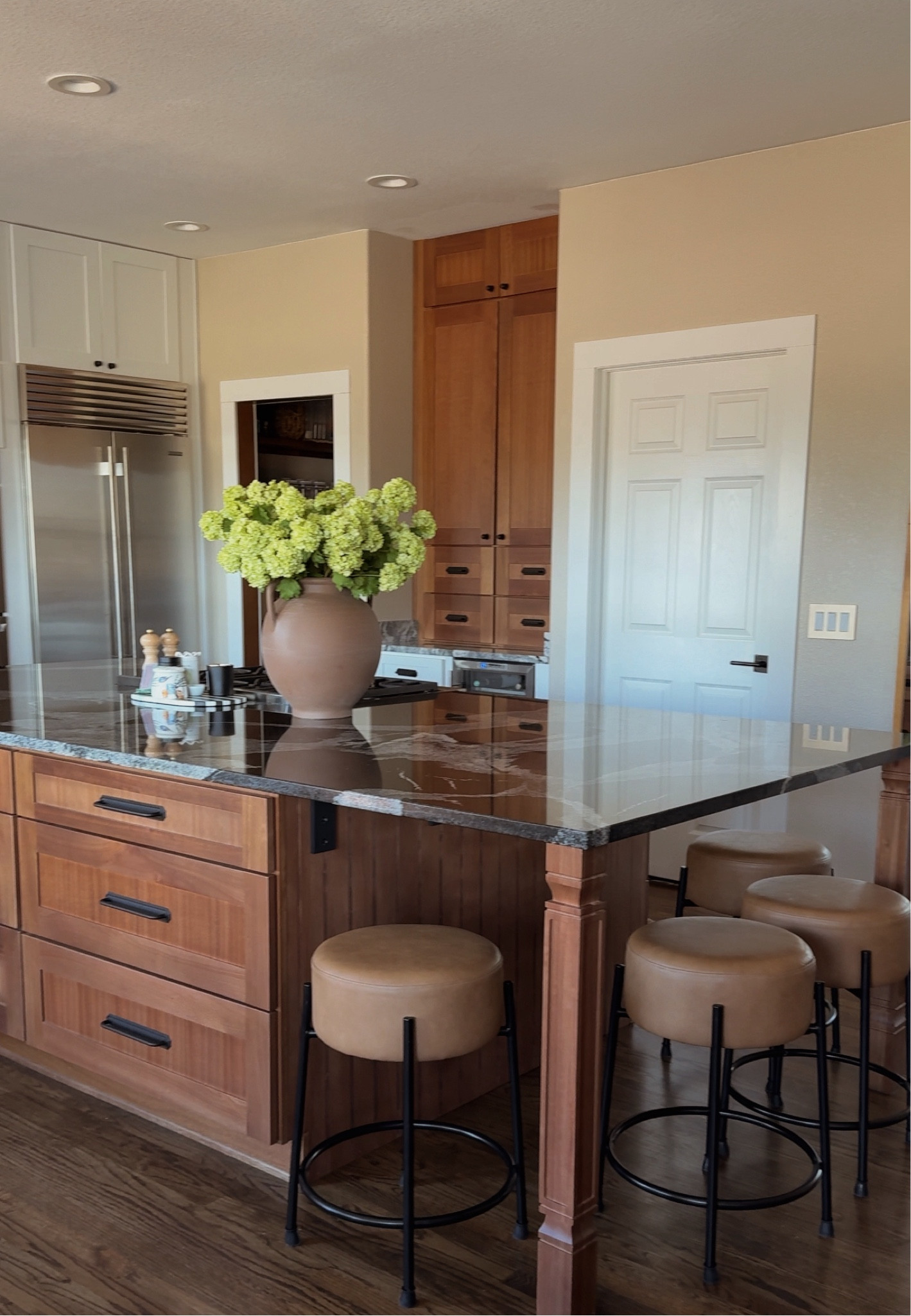 Kitchen decor in my home, spring kitchen decor, leather barstools, spring flowers, faux florals, afloral, kitchen inspo, kitchen decorr

#LTKSeasonal #LTKStyleTip #LTKHome