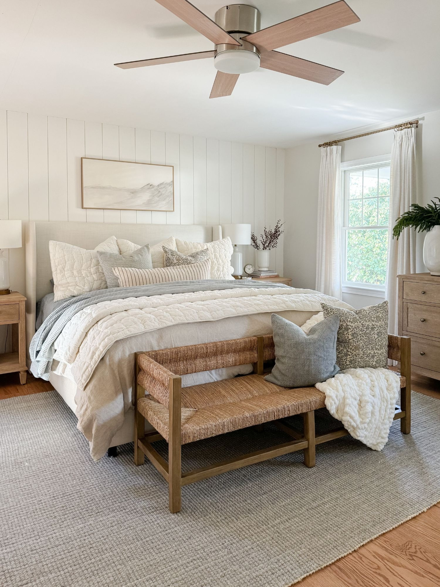 Soft whites, gentle blues, and natural textures create an airy coastal winter bedroom that feels light and peaceful. The woven bench and layered bedding add warmth without overpowering the space. Winter bedroom, coastal winter bedroom, neutral bedroom decor, layered bedding, soft blue bedding, coastal home style, woven bench, cozy coastal bedroom, light winter decor, serene bedroom retreat, Sherri Calnan Home

#LTKSeasonal #LTKHoliday #LTKHome