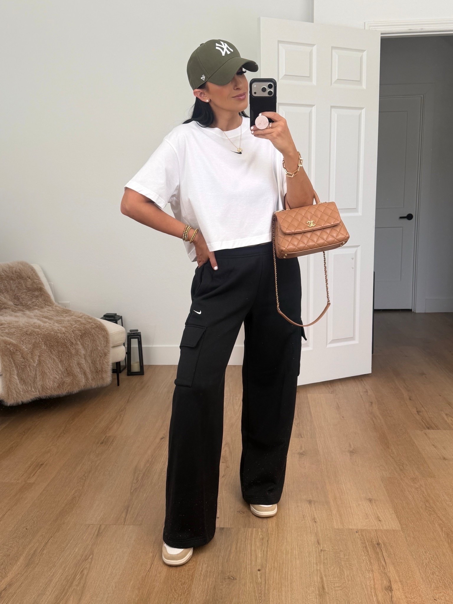 Nike Sportswear Phoenix Fleece wearing size small. Women's Loose Short-Sleeve Cropped T-Shirt wearing size medium. 
