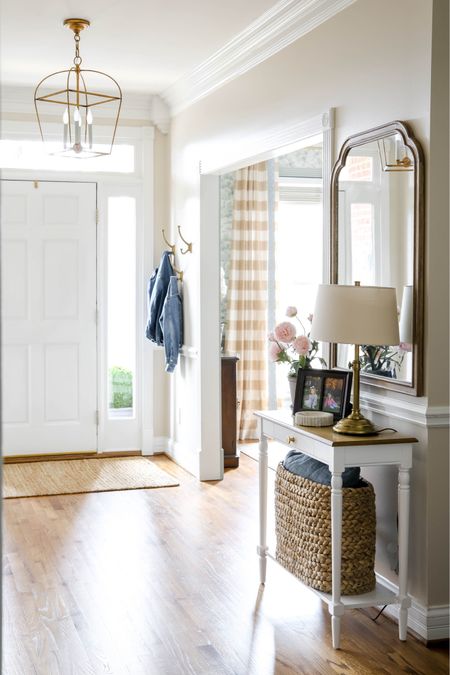 Our entryway features a side table, mirror, lamp, coat rack and a basket for storage. 

#LTKhome