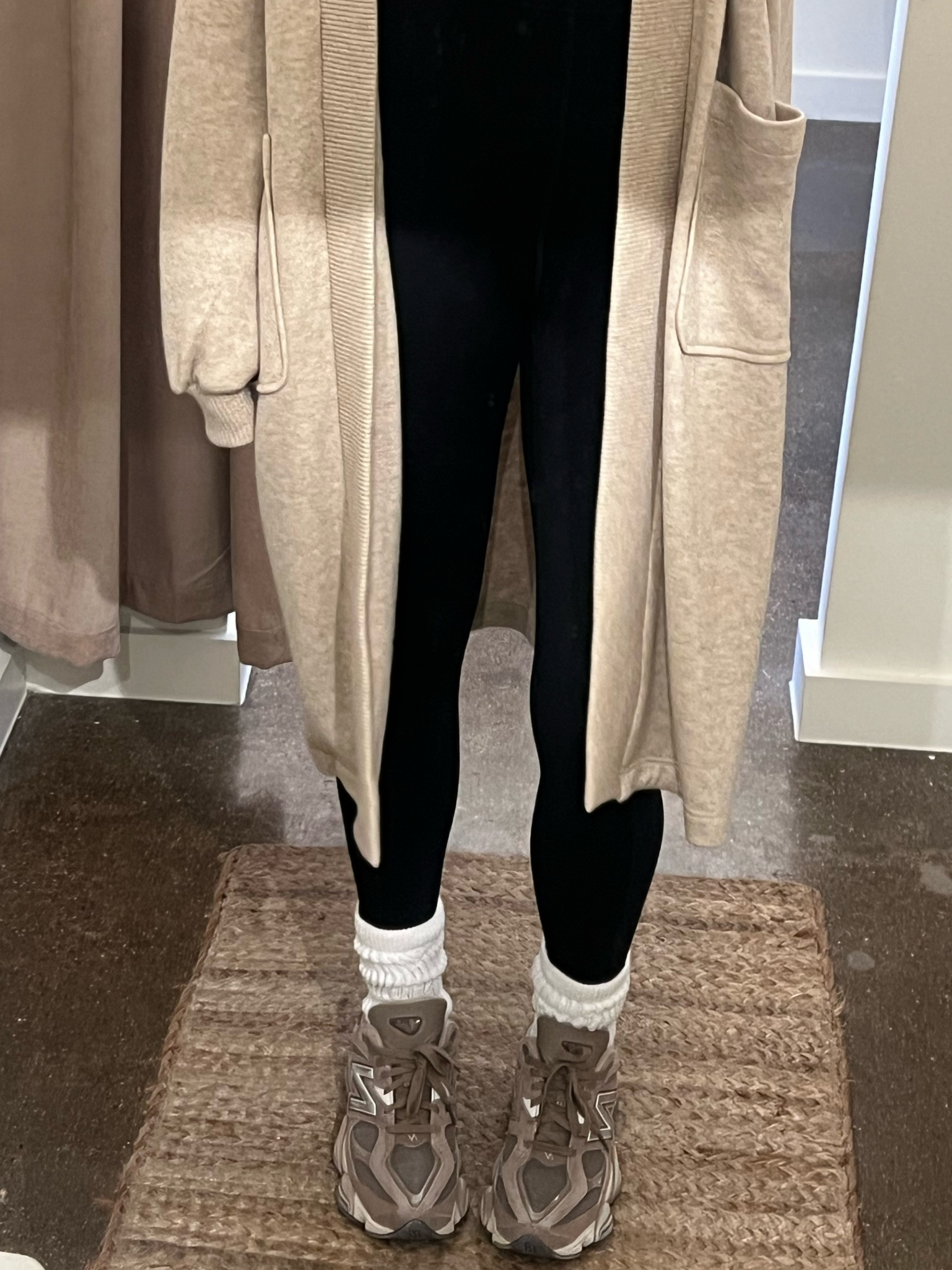 Comfy cozy outfit! Steve Madden long cardigan, chunky amazon white socks, new balance 9060 in mushroom, Aritzia winifred onesie! Winter ootd 

#LTKfindsunder100 #LTKover40 #LTKSeasonal