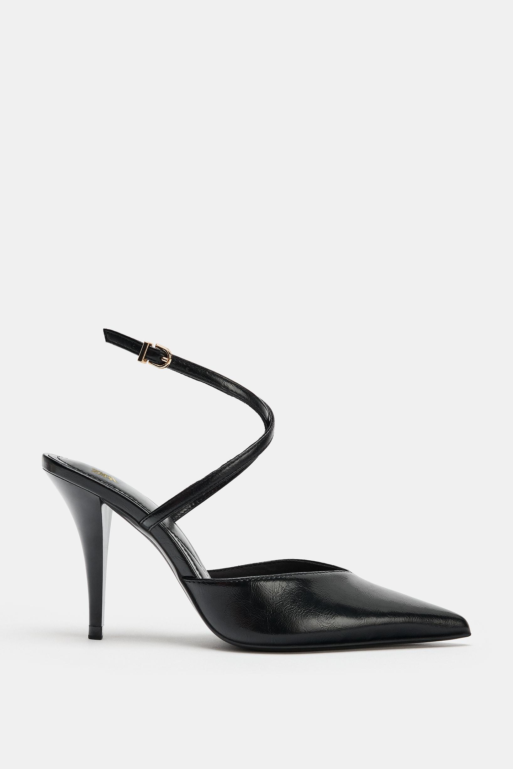 Model height: 181 cmHeeled slingback shoes. Criss-cross strap detail on the instep. Buckle fasten... | Zara DE