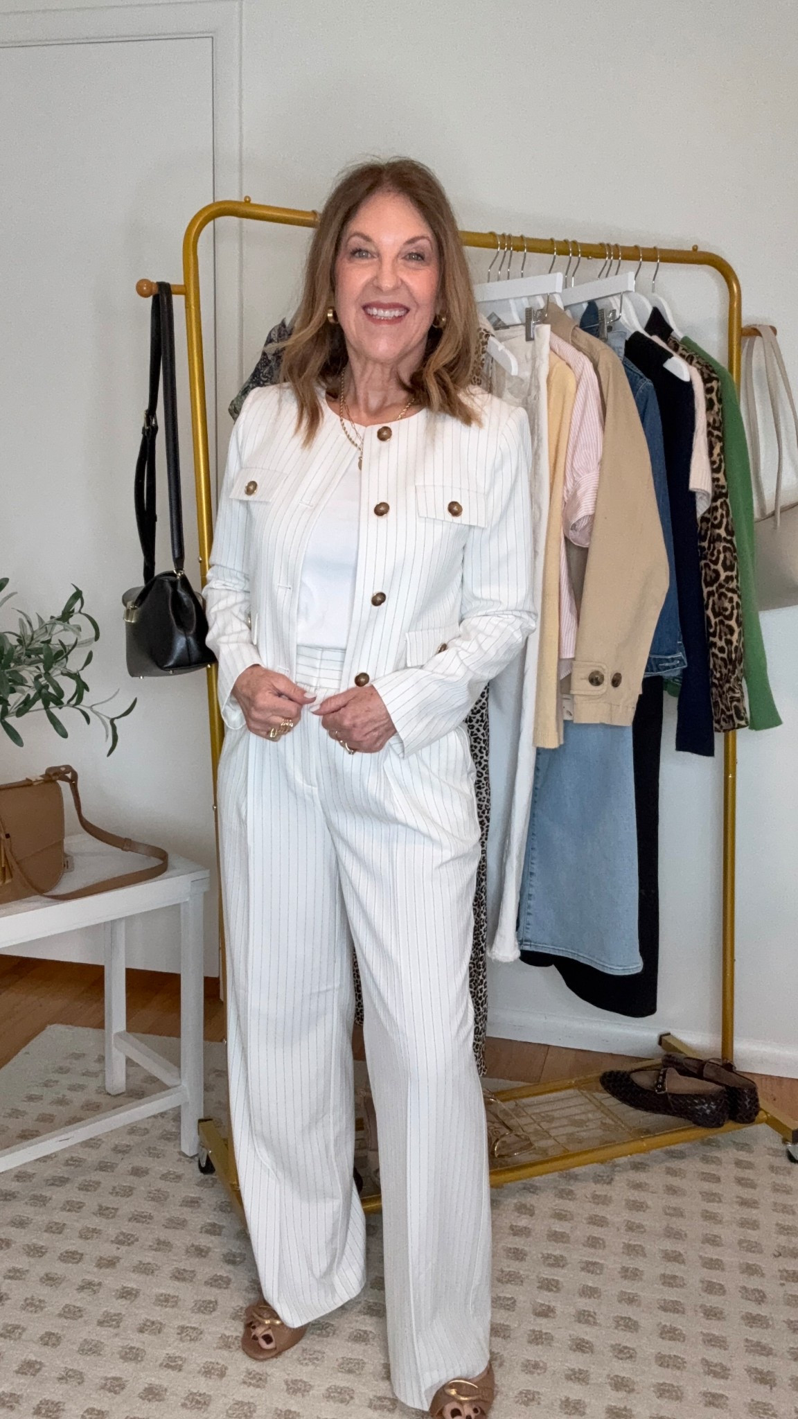 I’m wearing a suit from
Ann Taylor. 

Petite / lady  jacket / trousers / slides / tank 
I'm wearing a Size 0p jacket and 2p pants

#LTKWatchNow #LTKOver40 #LTKPetite