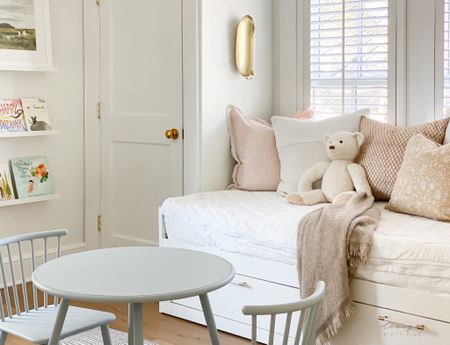 Arden’s Room sources #girlsroom blush patterned pillows, brass sconces, hand painted kids table, leather drawer pulls, window seat, daybed

#LTKkids #LTKhome #LTKbaby