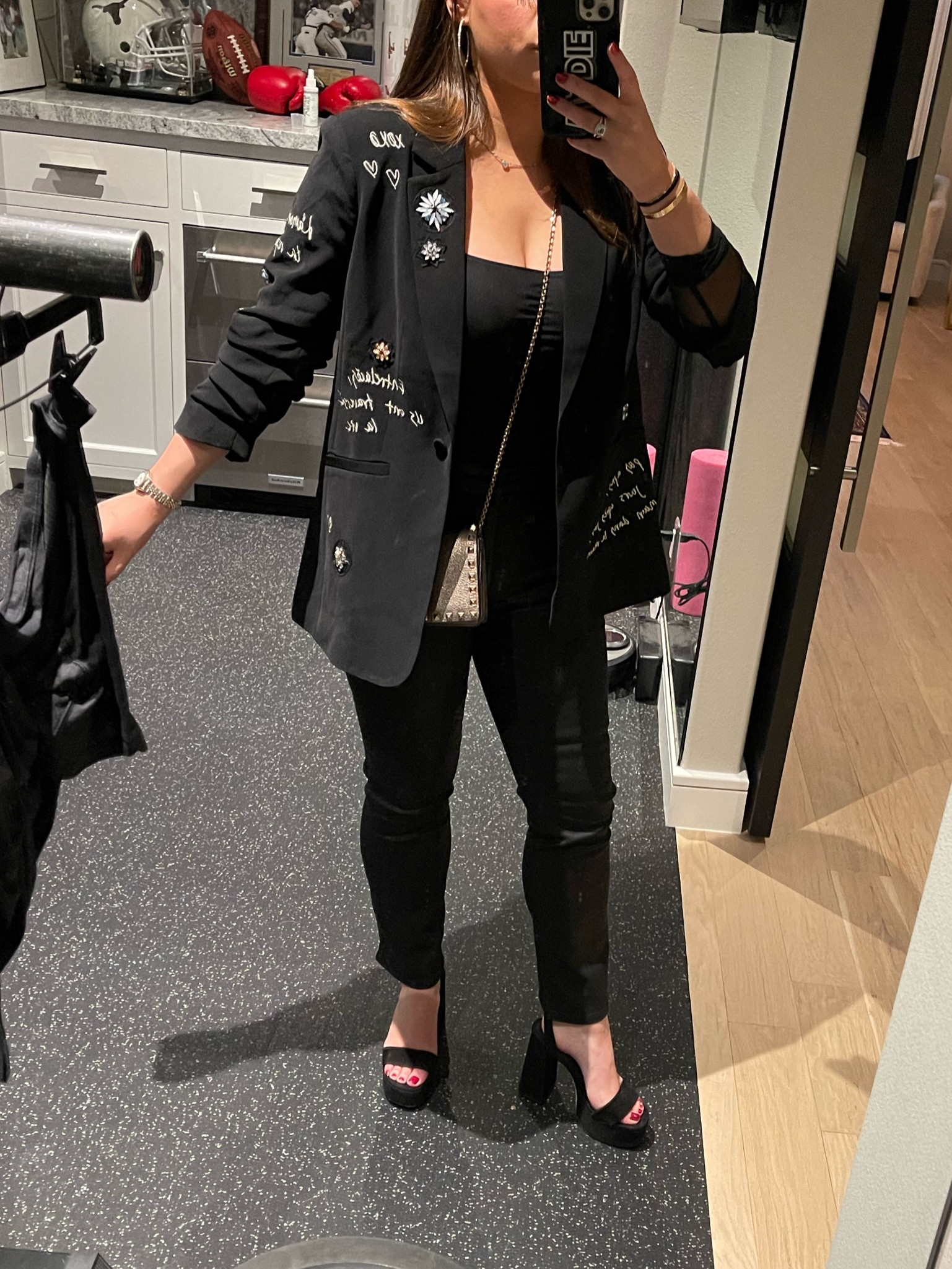 Blazer: cinq a sept Khloe love letter blazer (sold out, found at 2022 Nordstrom sale) — blazer is cool because of the stitching & different designs but while this one is sold out they are constantly coming out with new designs 

Jeans: coated straight leg good American 

Shoes: larroude black suede 

Purse: Valentino metallic wallet on chain (would google, couldn’t link) 

Earrings: @trisharyanstudio on insta! 

Bodysuit: Abercrombie, center torso is black and long sleeves are mesh that gives it a cool contrast! 