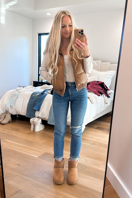 Tried on so many outfits before our trip trying to narrow down what I wanted to bring, but ended up bringing everything. 😂
This was one of my favorite outfits and is pretty close to what I wore to our early Thanksgiving. 
Wearing Madewell Jeans, Abercrombie Fax Leather Vest and Mini Ugg boots. 


#LTKstyletip #LTKshoecrush #LTKxAF