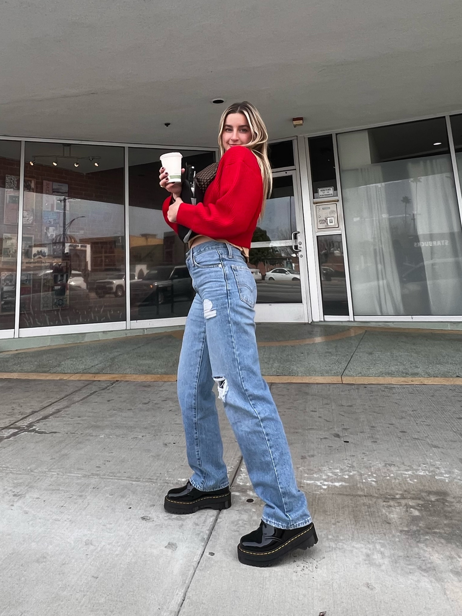 so nice gotta share it twice 🩵 love this comfy casual work outfit with the platform docs in my usual size (7.5/8) and jeans are 25s - love how baggy they are. they’re levi’s but i got them from target so linked a close version. they’re the 90s baggy levi’s. sweater from zara but i can’t link so im sharing similar ones. super comfortable pants and sweater and shoes need a break in but it’s worthhhh itttttt 🪩

#LTKshoecrush #LTKworkwear #LTKfindsunder100