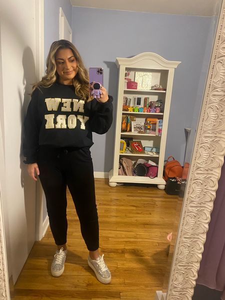 Day 18 ootd: all black fit
- diy black crewneck with glitter iron on letter patches
- black drawstring joggers
- rhinestone sneakers 

#LTKfit #LTKSeasonal #LTKunder50