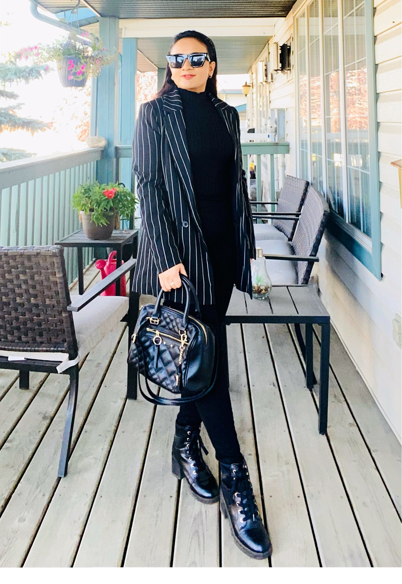 An office attire 
Oversized blazer, turtleneck sweater, black jeans, black purse, black ankle boots, sunglasses 

#LTKworkwear #LTKstyletip #LTKSeasonal