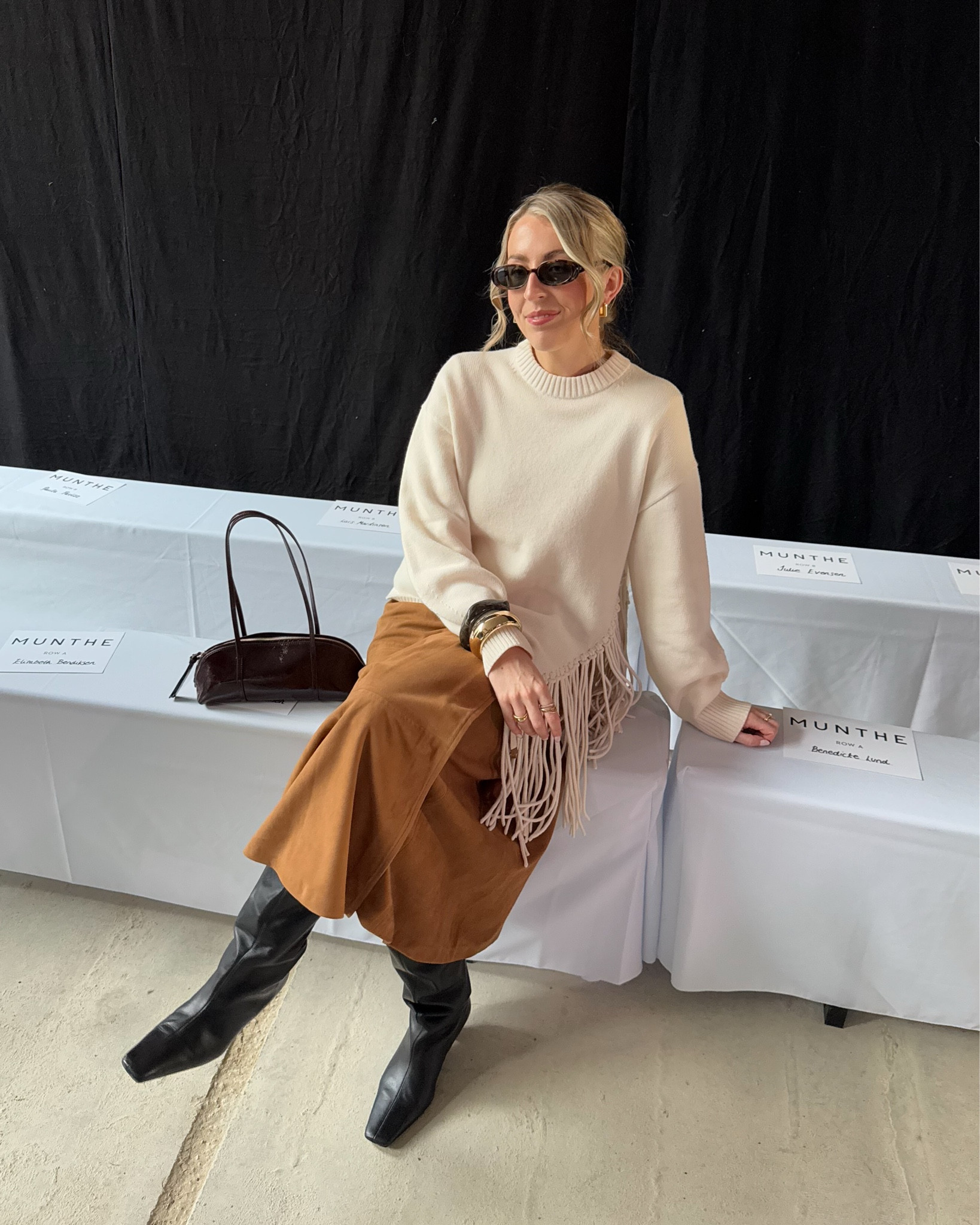 Suede skirt outfit for the Munthe show #cphfw #cphfw25

Knee high boots, cream jumper, tasseled jumper, suede, shoulder bag 

#LTKuk #LTKFashionMonth #LTKstyletip