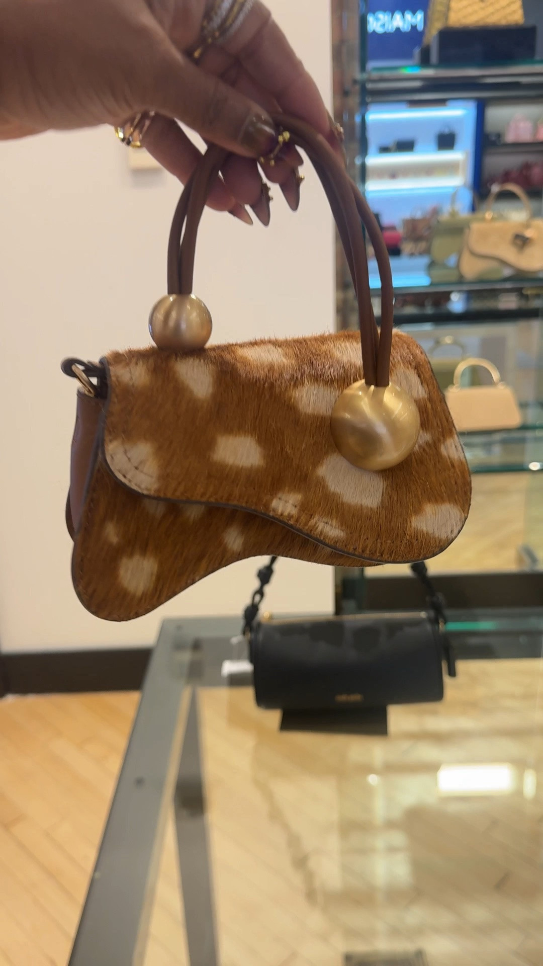 Tiny bag. Big personality.

This calf hair crossbody bag is small, but it does not disappear. I love the spotted calf hair, sculptural shape, rounded top handle, gold hardware, and crossbody strap because it feels playful, polished, and easy to style.

Style Tip: Let the print work like a neutral. Pair it with denim, linen, an all-black look, or simple summer separates when you want the bag to add texture without taking over.

Kurated by Kéla

#LTKootd #LTKTravel #LTKgrwm