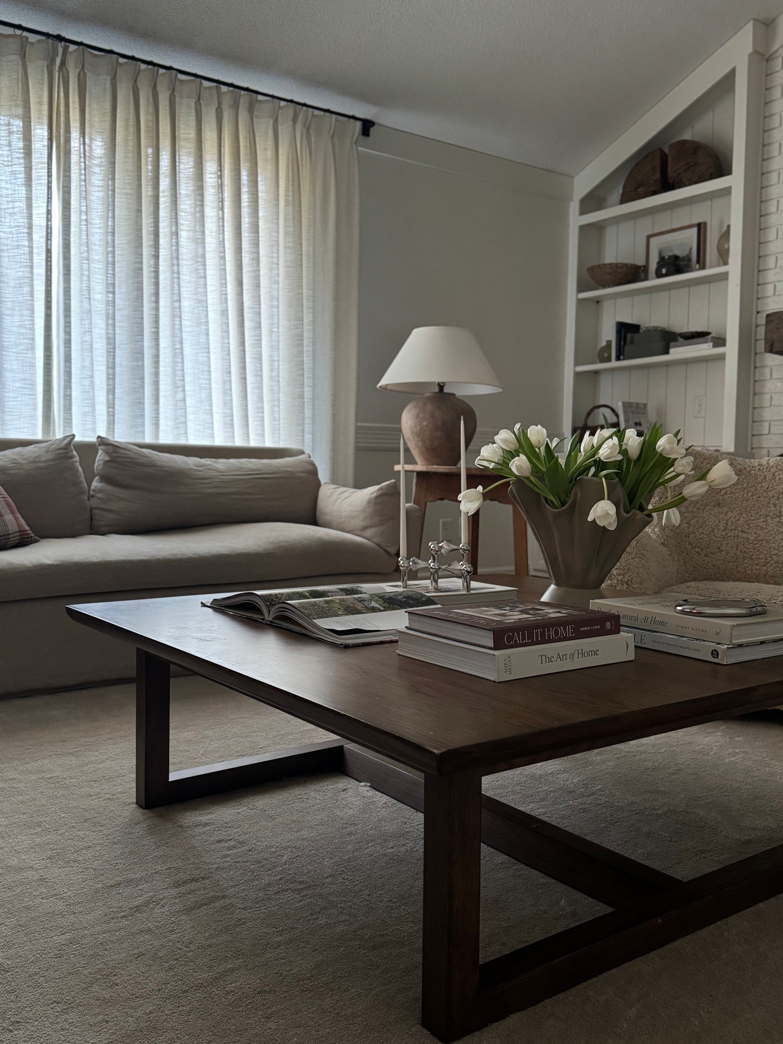 Living room spring decor for our coffee table 

Faux flowers
Home decor
Area rug
Couch sofa 

#LTKSeasonal #LTKStyleTip #LTKHome