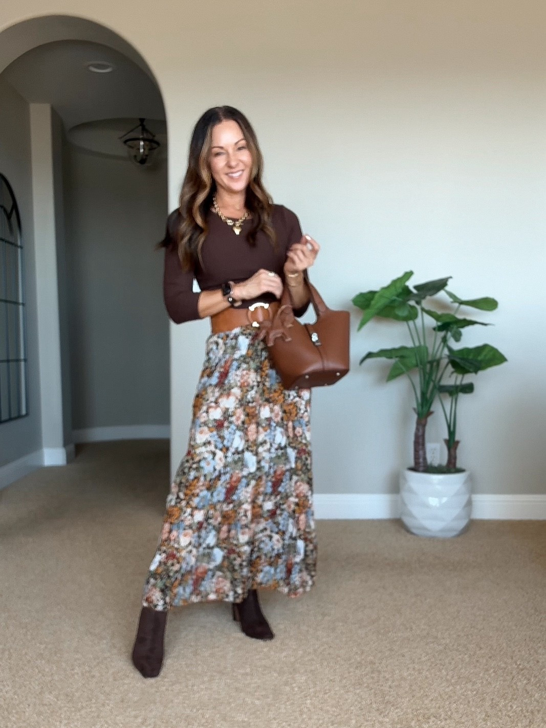 Fall outfit for the office, workwear, church, floral maxi ski skirt that doesn’t wrinkle small, three-quarter length sleeve rib, top size XS boots go up a half a size. For reference I’m 5‘1“, 109 LBS.

#LTKPetite #LTKOver40 #LTKWorkwear