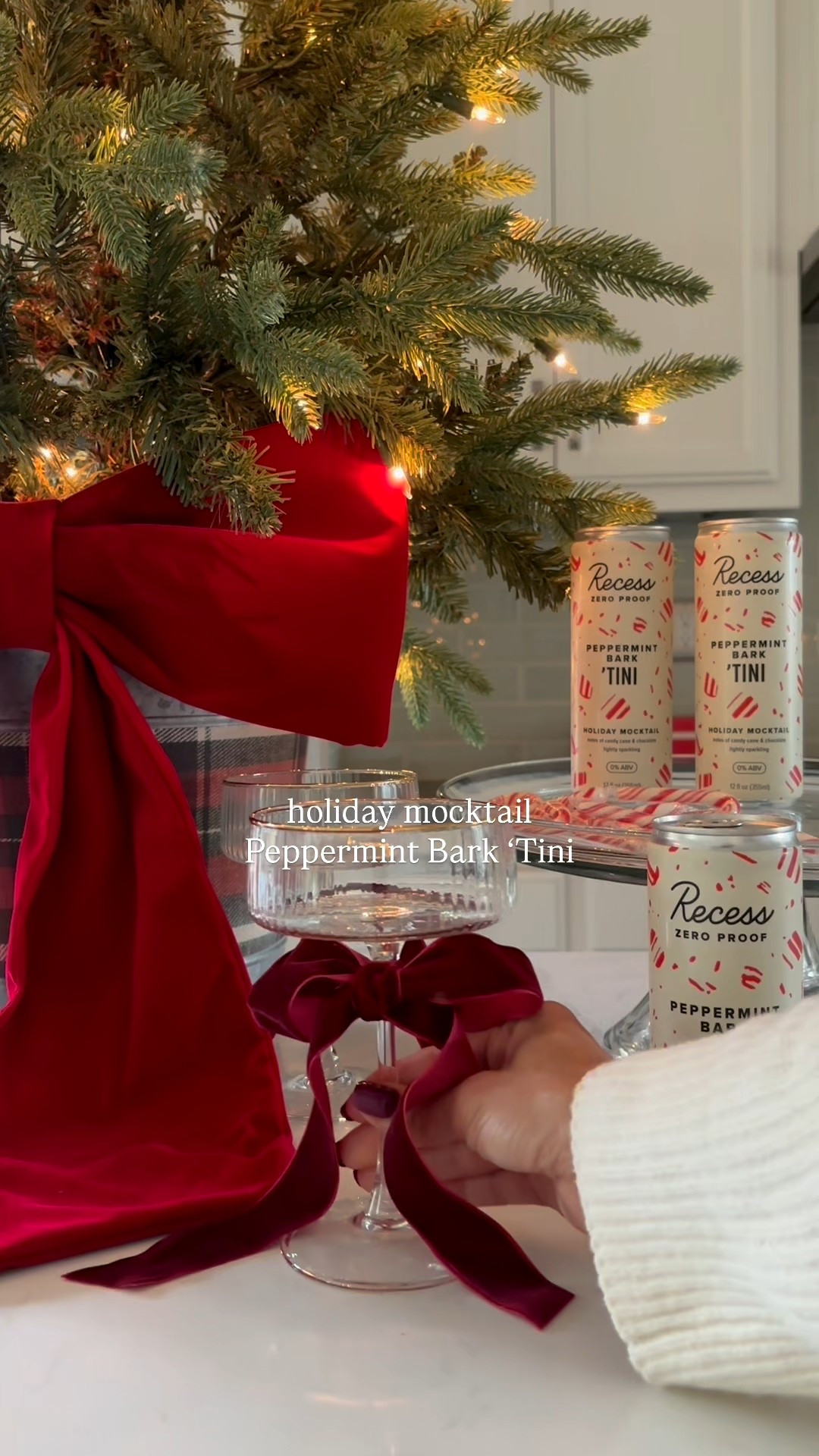 A festive, easy mocktail with a candy cane rim, a velvet bow, and the Recess Peppermint Bark ‘Tini. Pour into a coupe and voilà.

Gold rimmed coupe glasses, holiday, hosting ideas, velvet burgundy ribbon, candy, cane rimmed mocktail , extra large red velvet bow,

#LTKHoliday #LTKHome #LTKCyberWeek