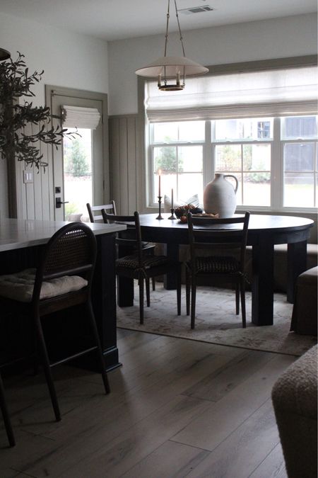 Kitchen nook, moody kitchen, banquette, black dining table 

#LTKfindsunder100 #LTKhome #LTKstyletip