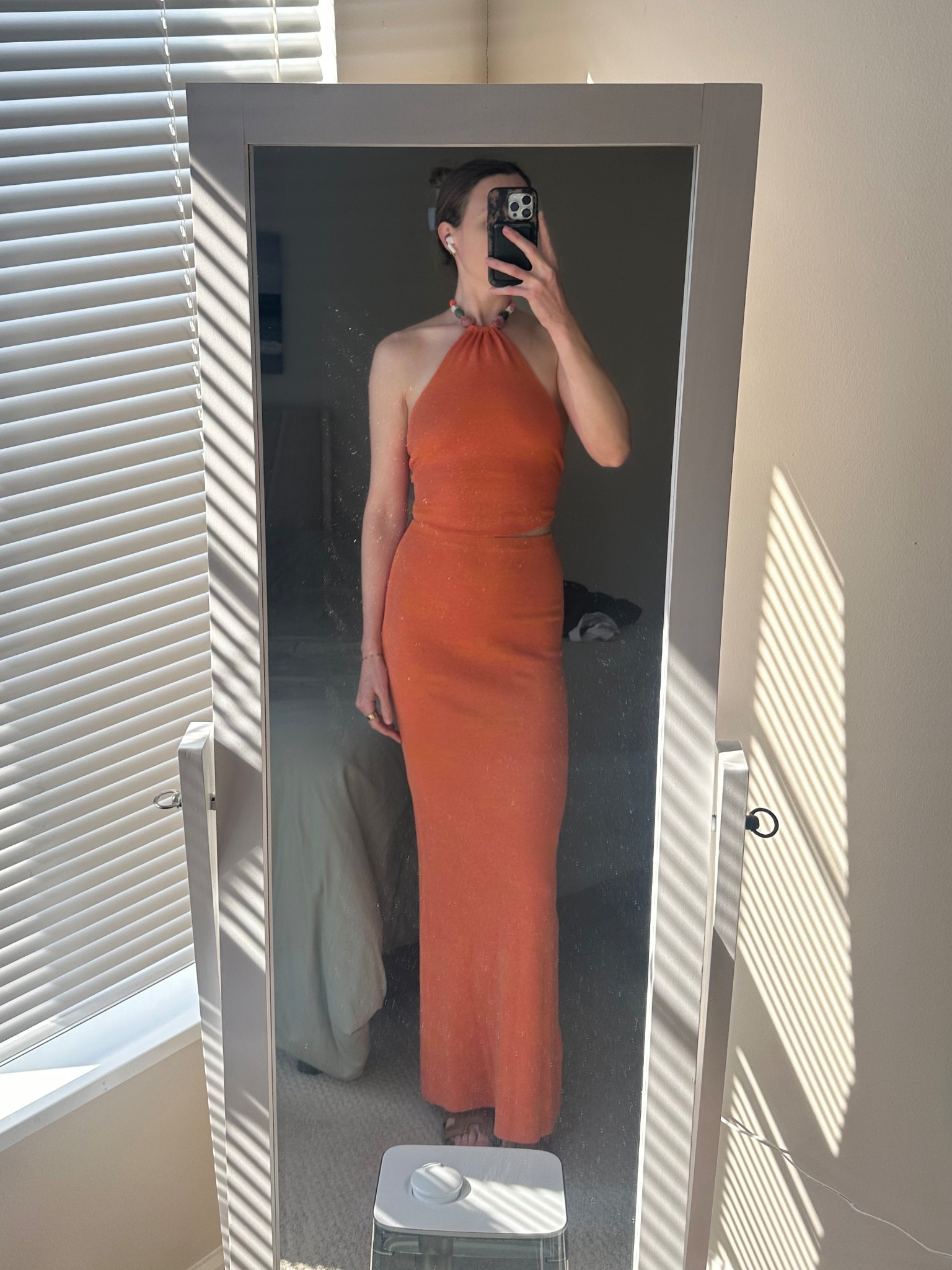 Shimmer orange halter top and maxi skirt 

#LTKgrwm #LTKTravel #LTKSeasonal