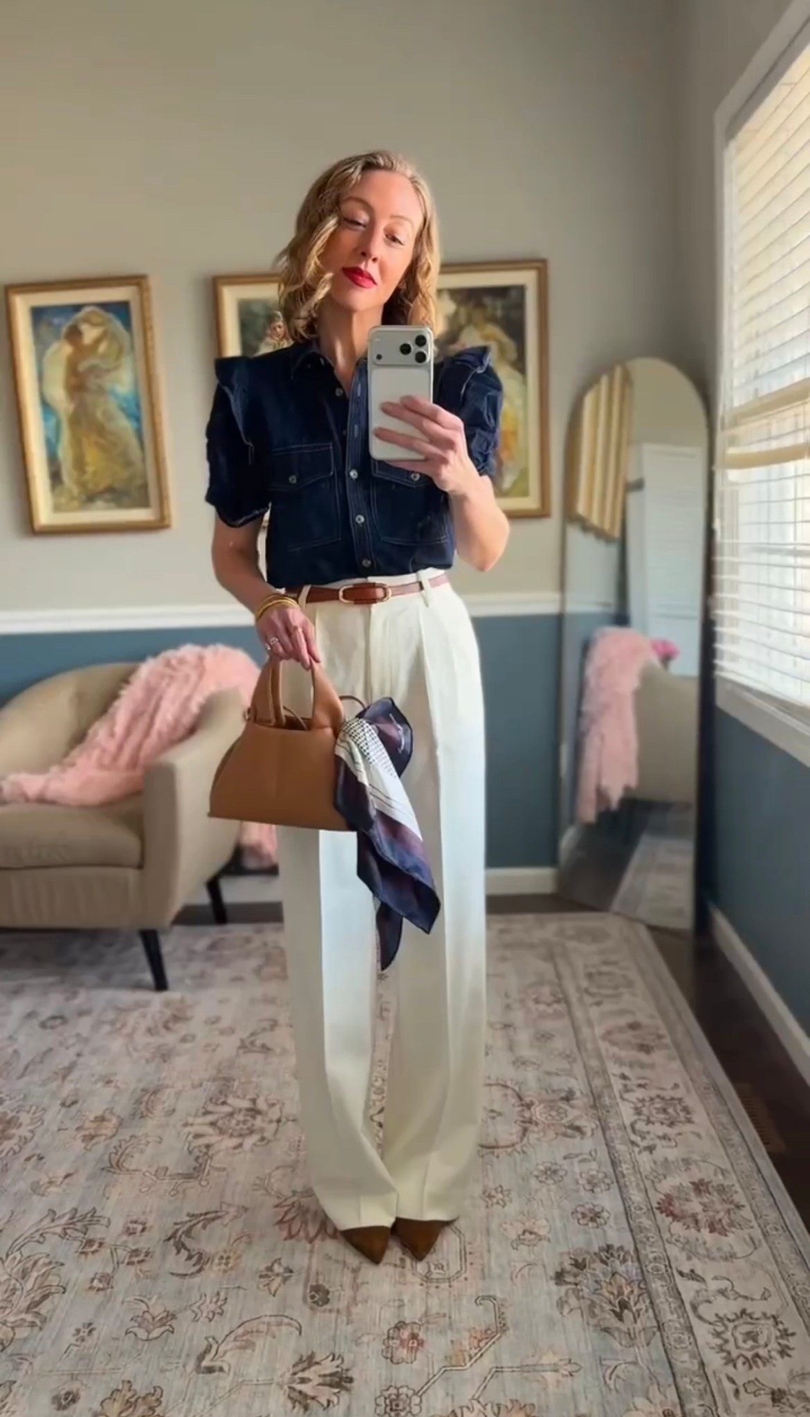 Dark denim button-down shirt, cream wide-leg trousers, brown leather belt, pointed suede heels, and structured tan handbag.

Classic spring outfit idea for work, lunch, or everyday wear.

Timeless American style.


#LTKspring #LTKootd #LTKspringtrends