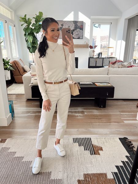 Winter white outfit for a smart casual workwear look or weekends. Pairing this turtleneck knit in size XS with straight leg ivory jeans in size XS and my favorite white leather sneakers  

#LTKshoecrush #LTKstyletip