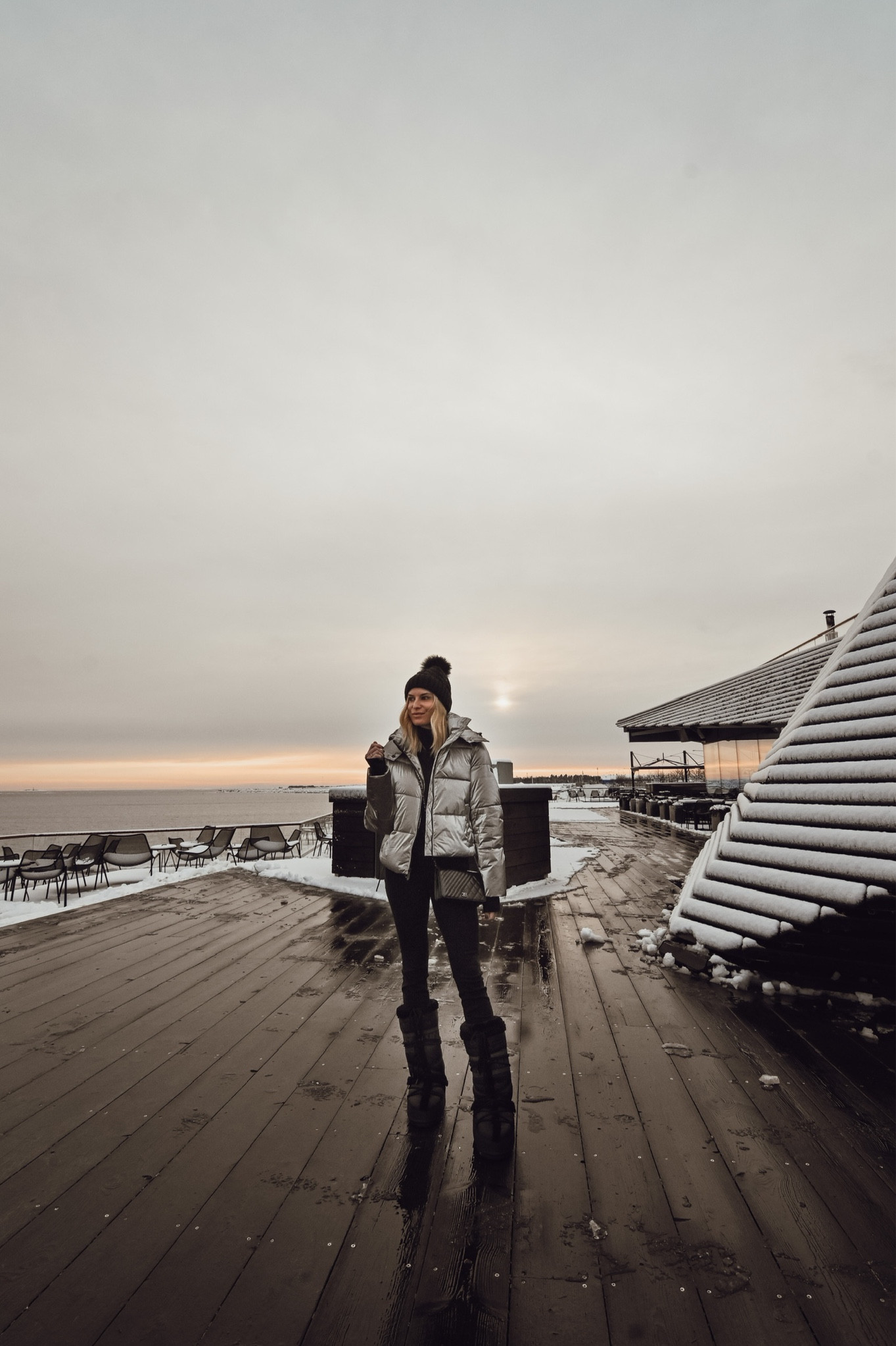 Finland look🤍 metallic puffer coat, similar moon boots, black beanie and faux leather leggings. 

#LTKtravel #LTKstyletip #LTKSeasonal