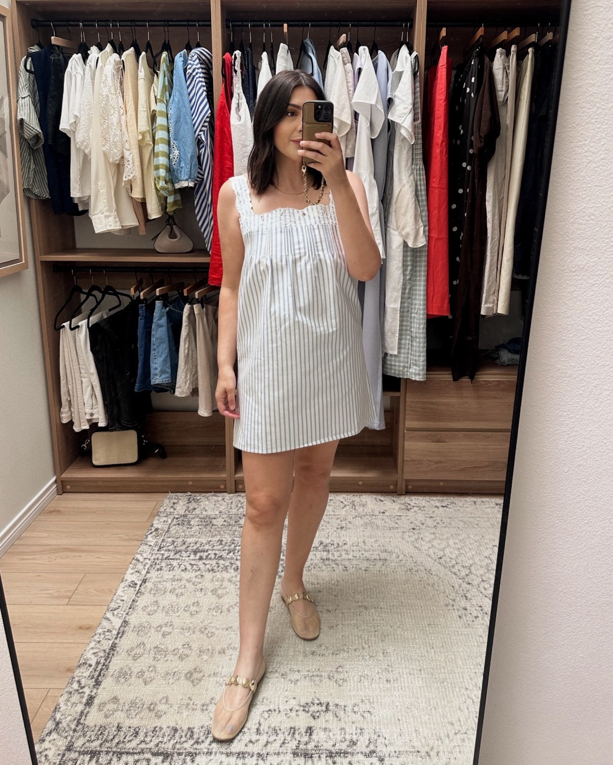 I just got this dress in and I love it. It’s a light blue stripe (hard to see here!) and it’s a fully lined, more stiff fabric (cotton blend? I believe). It has a zipper on the side, and it keeps its more structured shape.  Typically dresses like this are a tough fit for me with bigger boobs, but this fit great! With some wiggle room as well. I’m in the large.  

@jcrew 

 
