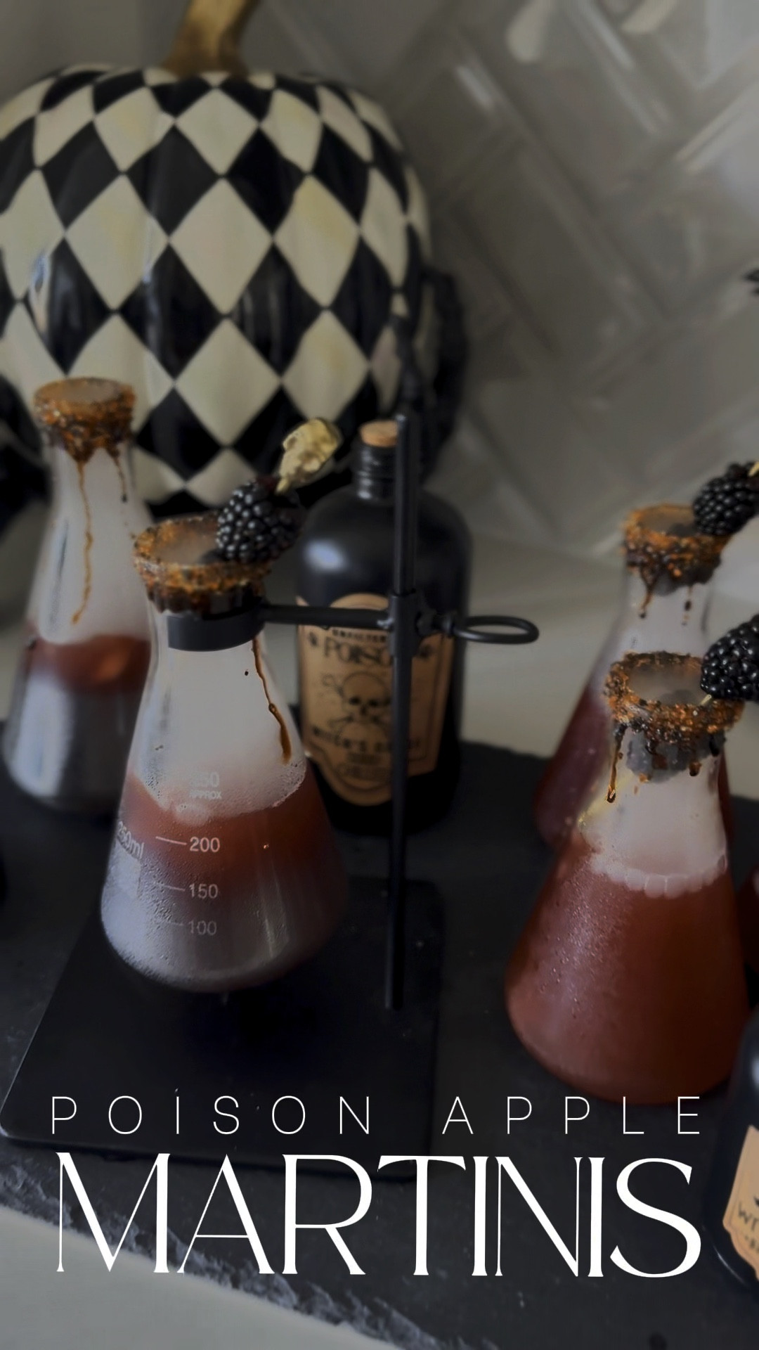 Yall these poison apple martinis are so fun and delicious!!!! They’re super easy to make and can be batched and made ahead of time! Just add the dry ice before serving and wait until it melts all the way before drinking! It can be dangerous to drink it before it’s melted. Recipe:
Rim a glass or fun flask with black sugar
2 oz Apple vodka (I use ciroc)
1/2 cup apple cider
2 tbsp pomegranate juice
1 tbsp lemon juice
Garnish with apple or blackberriess

#LTKVideo #LTKSeasonal #LTKHalloween