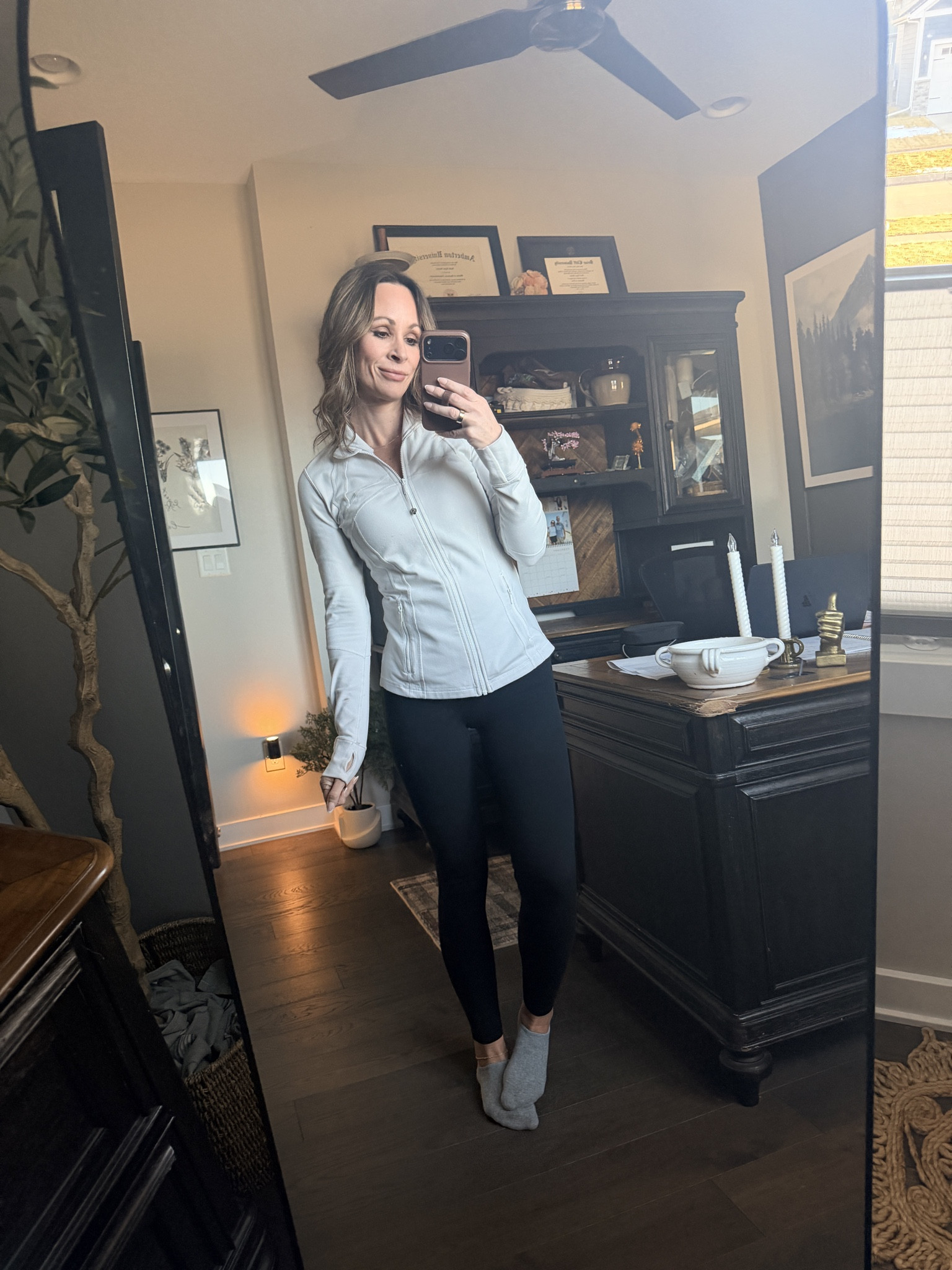 What a nice easy outfit. Cozy socks, and slippers, black leggings, a tank top, and a classic defined jacket. This white jacket from Lululemon is always such a fun classic. These are my favorite black leggings, ever. Lululemon ones are also great, and then no front seam line, but these Amazon ones are just as lovely and a fraction of the price!

#LTKmomlife #LTKOver40 #LTKActive