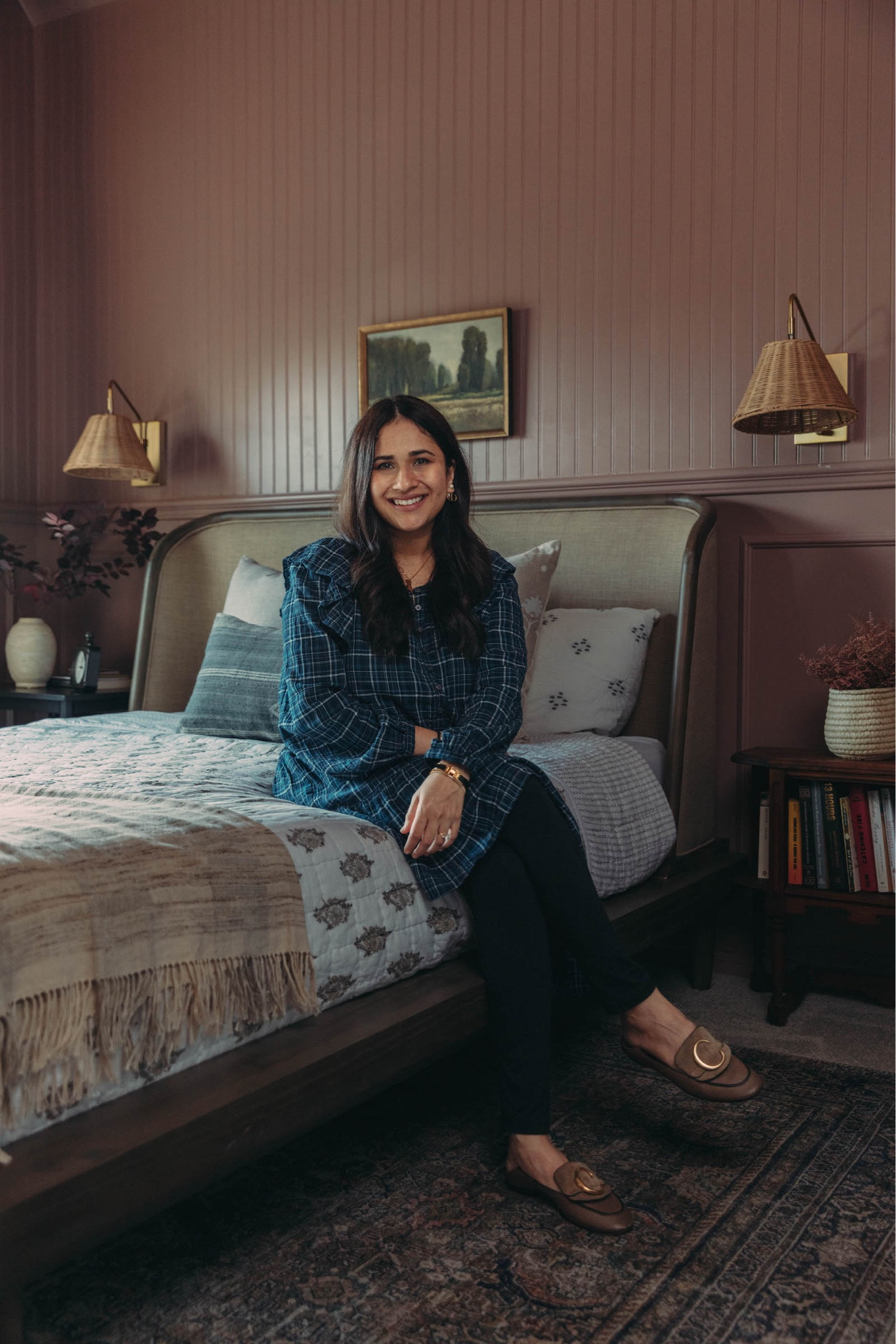 Pink guest bedroom with wall paneling and rattan wall sconces 

#LTKhome #LTKstyletip #LTKsalealert