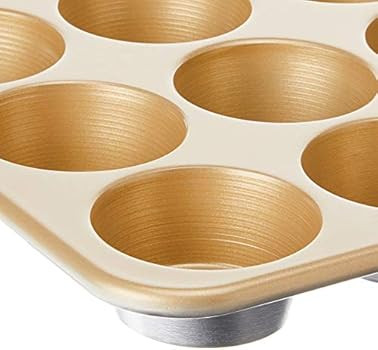 Nordic Ware Naturals Aluminum NonStick Muffin Pan, Twelve 2-1/2 Inch Cups | Amazon (US)